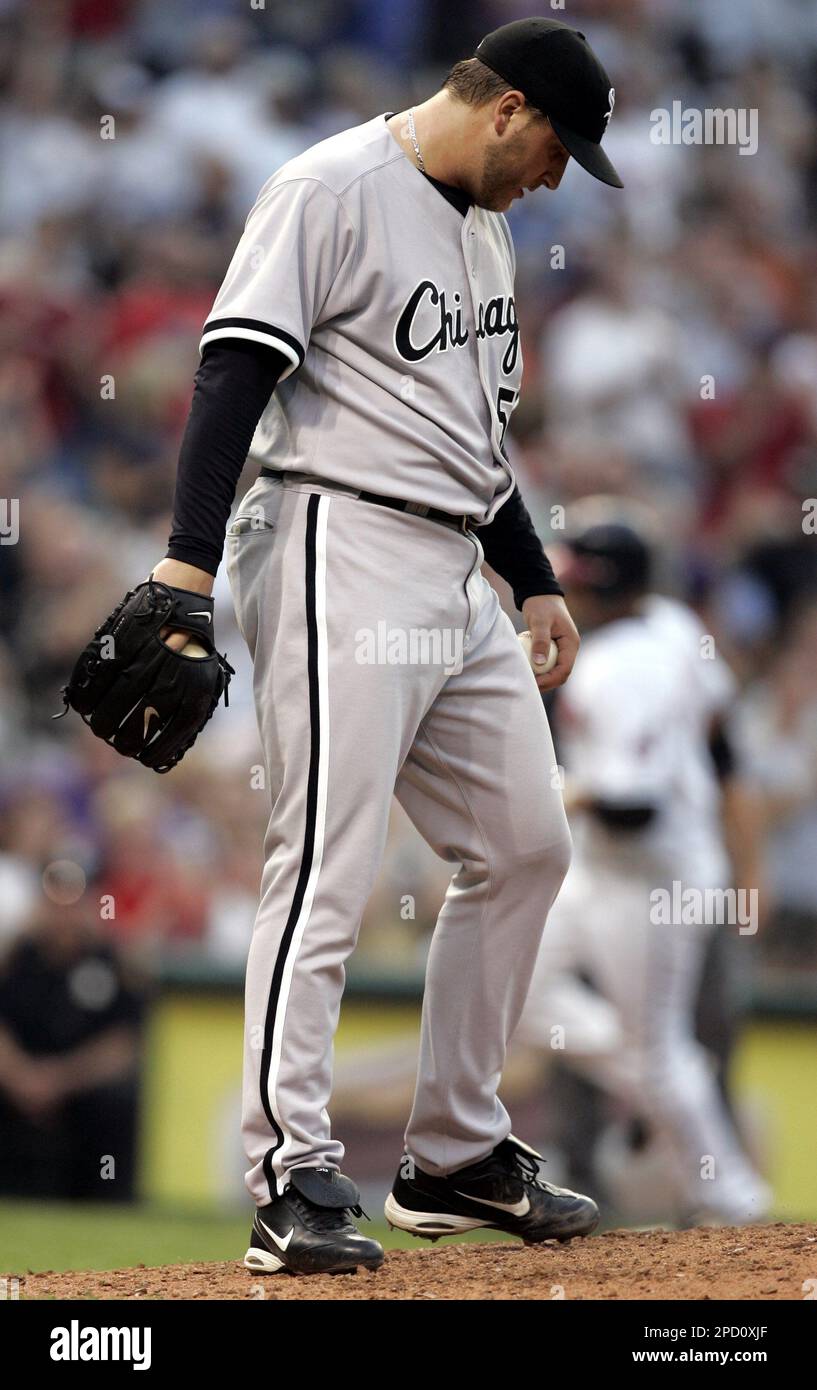 Chicago White Sox pitcher Mark Buehrle kicks the dirt as Cleveland