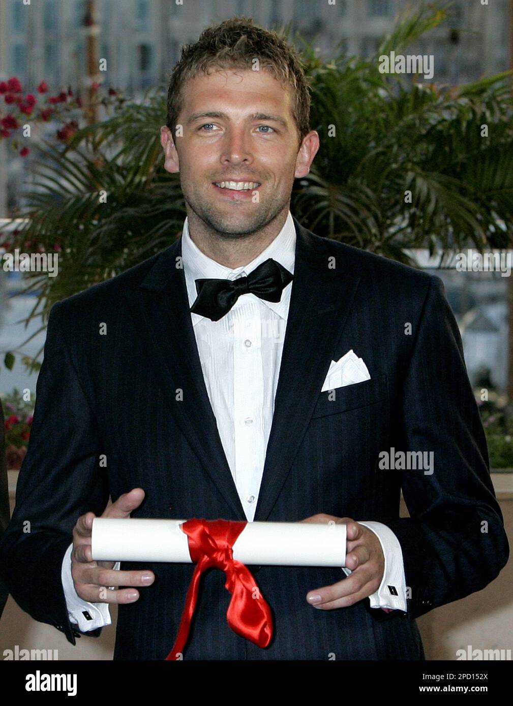 Norwegian director Bobbie Peers poses with his prize for best short