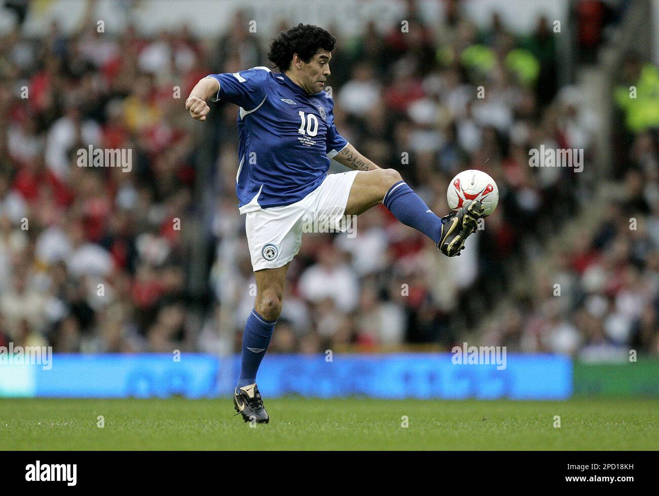 Rest of the World player Diego Maradona shows off his skills as he plays against England celebrity XI in the Soccer Aid Charity soccer match at Manchester United s Old Trafford Stadium in