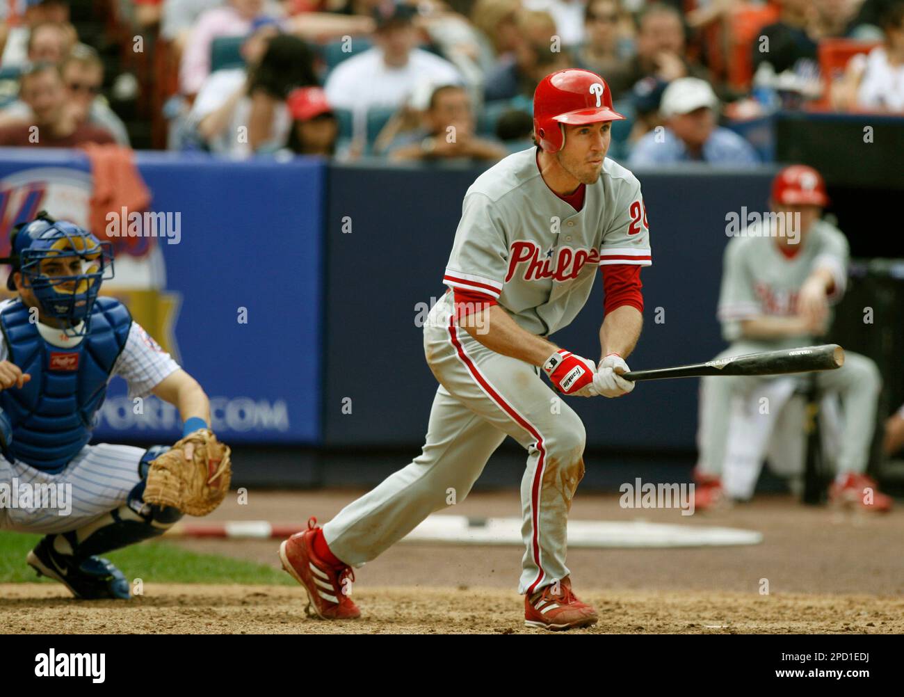 Philadelphia Phillies' Chase Utley watches his solo home run