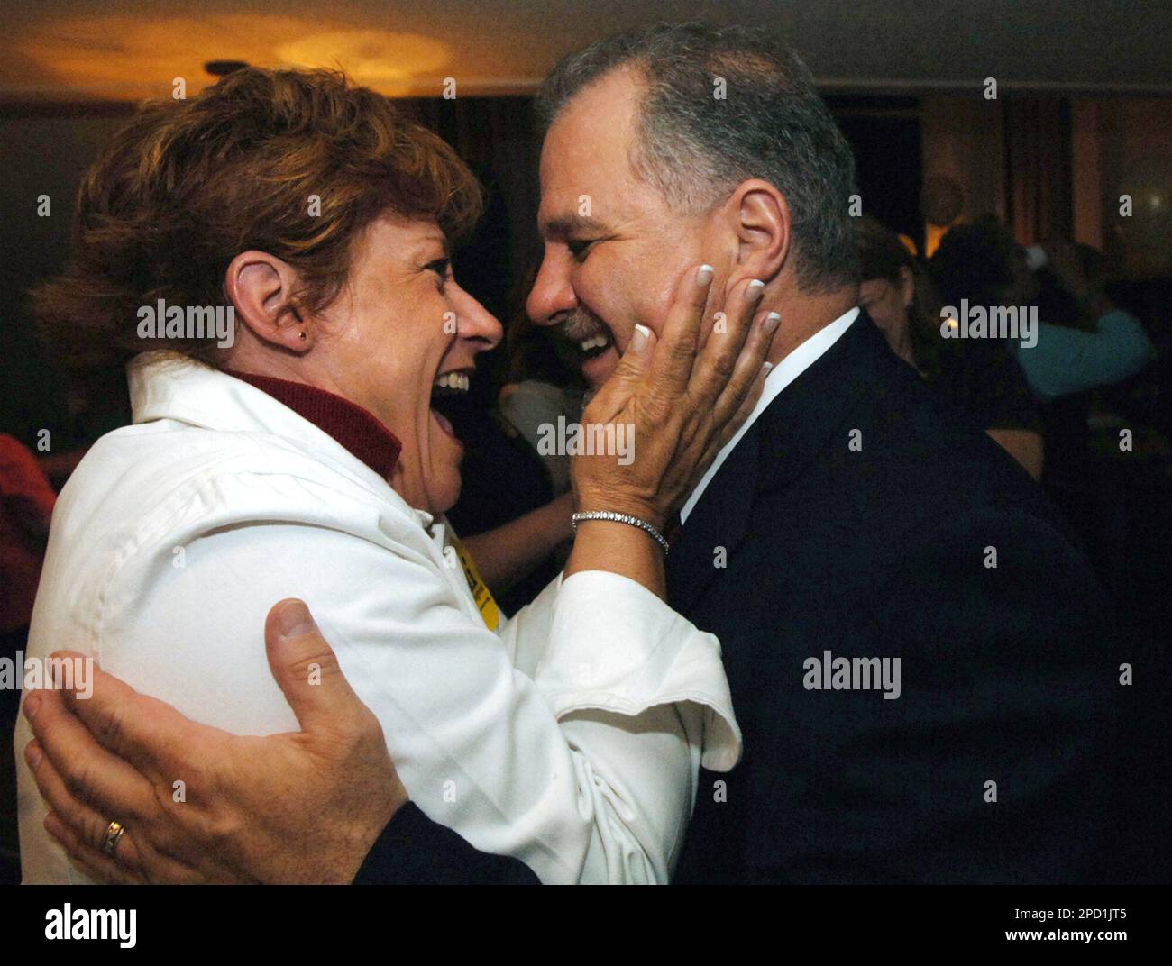 First Congressional District candidate Bill Sali, right, embraces 