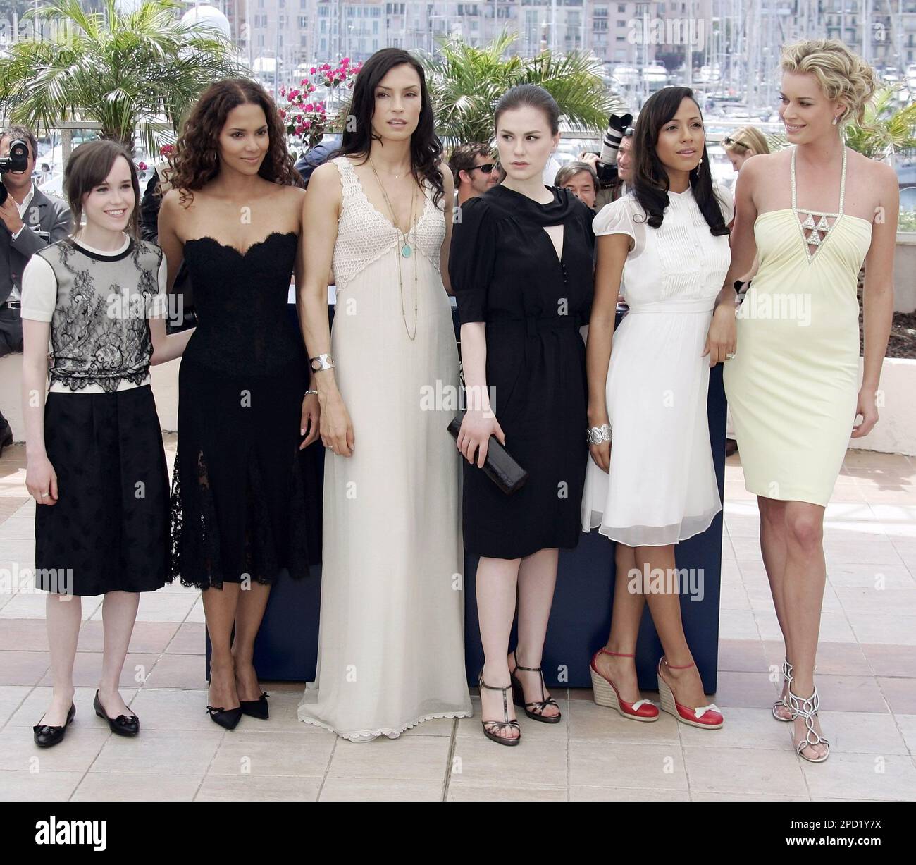 From left, actors Ellen Page, Halle Berry, Famke Janssen, Anna Paquin,  Dania Ramirez, and Rebecca Romijn pose during a photo call for the film  "X-Men: The Last Stand," at the 59th International