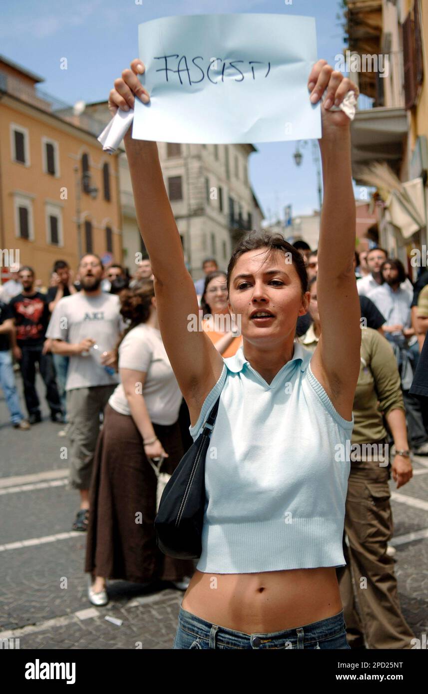 Italian police officers contain counter-demonstrators against Stefano  Gizzi, Christian Democrat party's city councillor in Ceccano, a small town  on the outskirts of Rome, and AN right-wing National Alliance party  colleague Massimo Ruspandini
