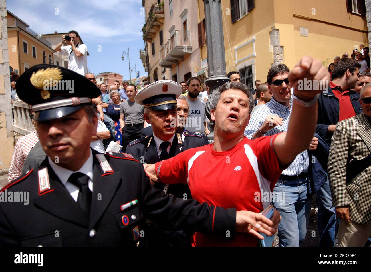 Italian police officers contain counter-demonstrators against Stefano  Gizzi, Christian Democrat party's city councillor in Ceccano, a small town  on the outskirts of Rome, and AN right-wing National Alliance party  colleague Massimo Ruspandini