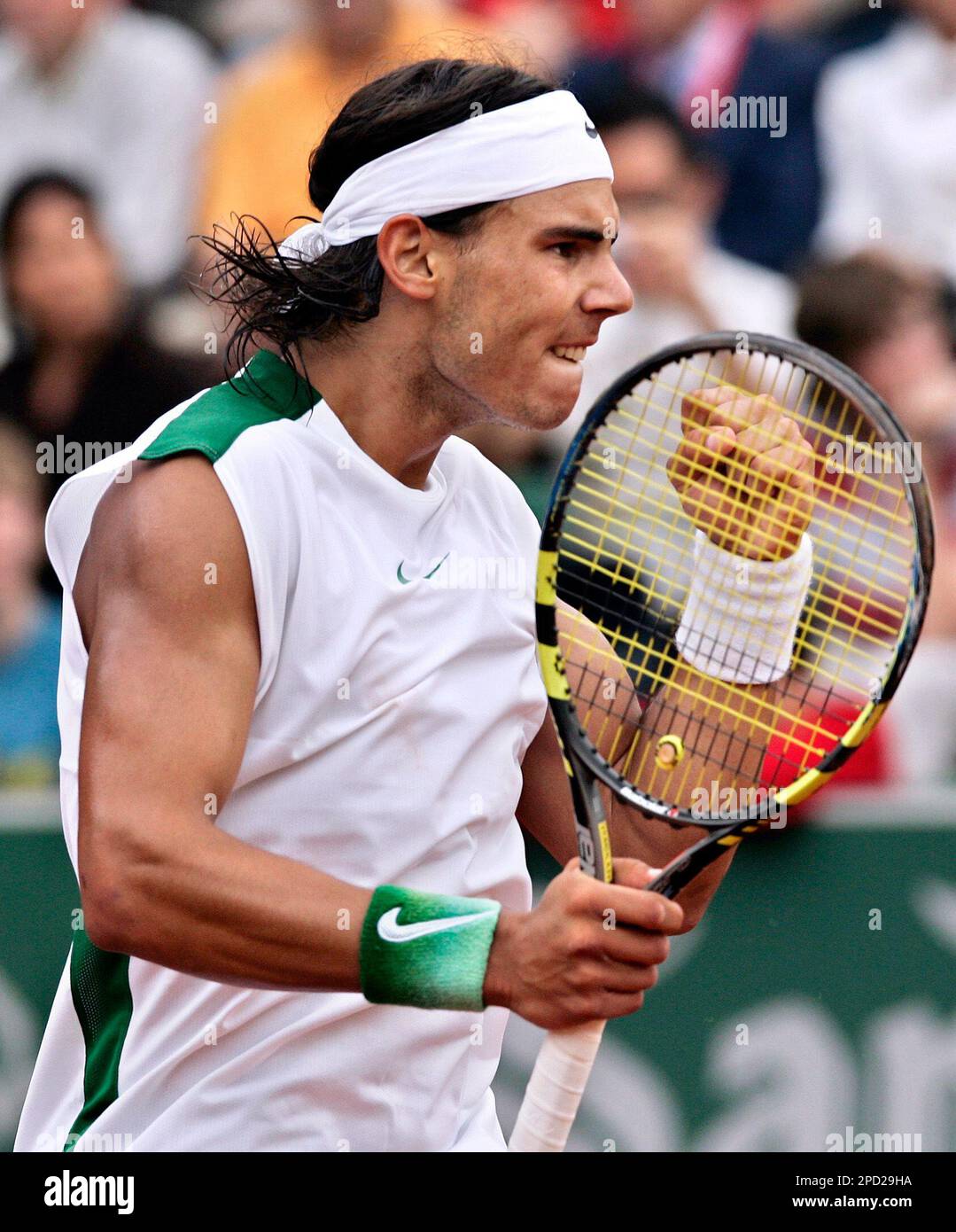 file-spains-rafael-nadal-celebrates-a-point-against-tommy-robredo-from-spain-during-their-final-tennis-match-at-the-open-seat-godo-2006-in-barcelona-spain-sunday-april-30-2006-spaniards-might-be-forgiven-a-burst-of-bravado-over-their-dazzling-success-of-late-in-the-world-of-sports-theyre-in-a-lather-over-fc-barcelonas-crowning-as-europes-premier-soccer-club-sevillas-triumph-as-uefa-cup-champs-teenage-tennis-sensation-rafael-nadals-53-straight-victories-on-clay-and-his-latest-victory-over-top-ranked-roger-federer-fernando-alonsos-domination-of-formula-one-racing-and-motogp-2PD29HA.jpg