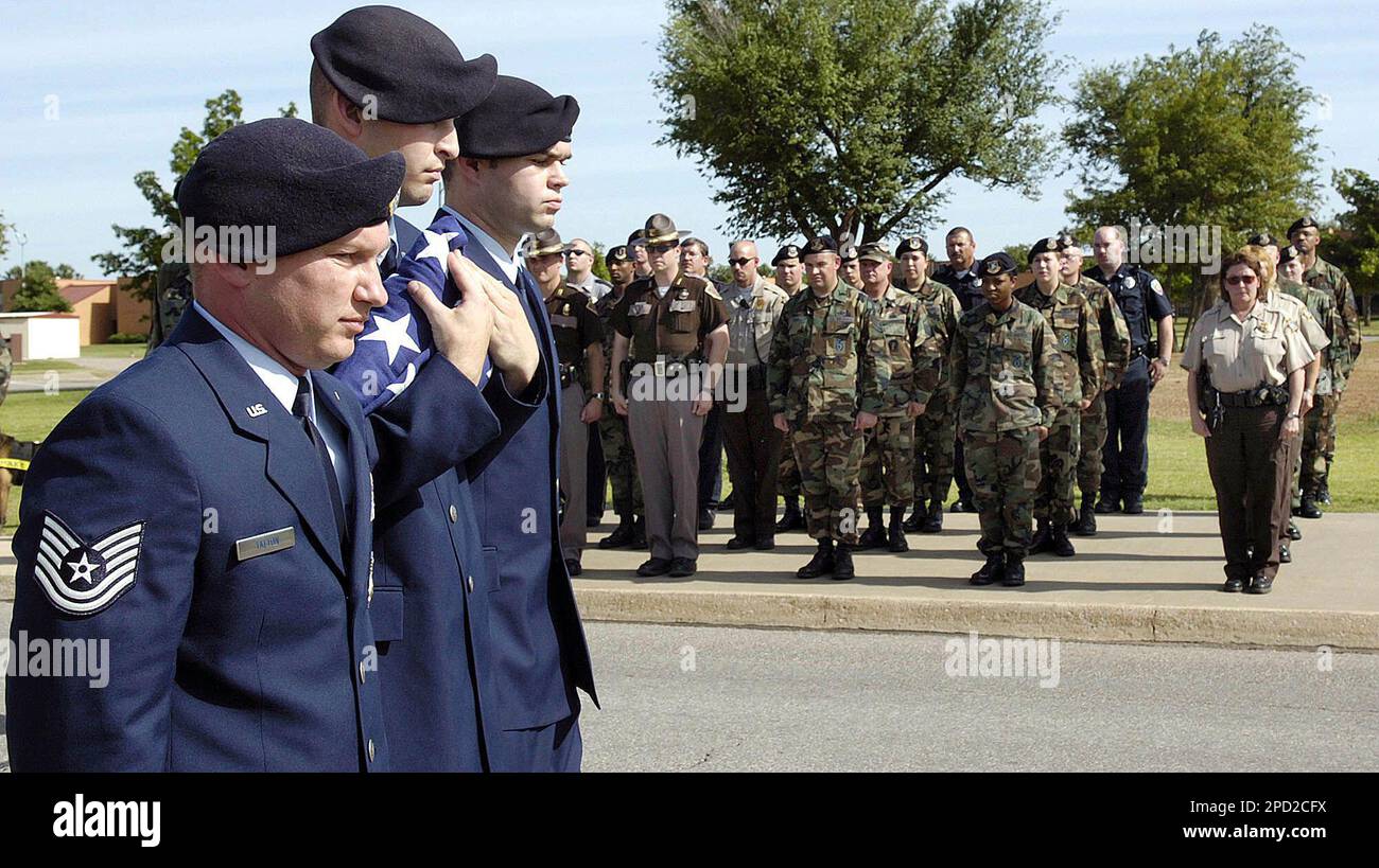 Tech. Sgt. Travis Talton, left, Airman 1st Class Michael Moore, and