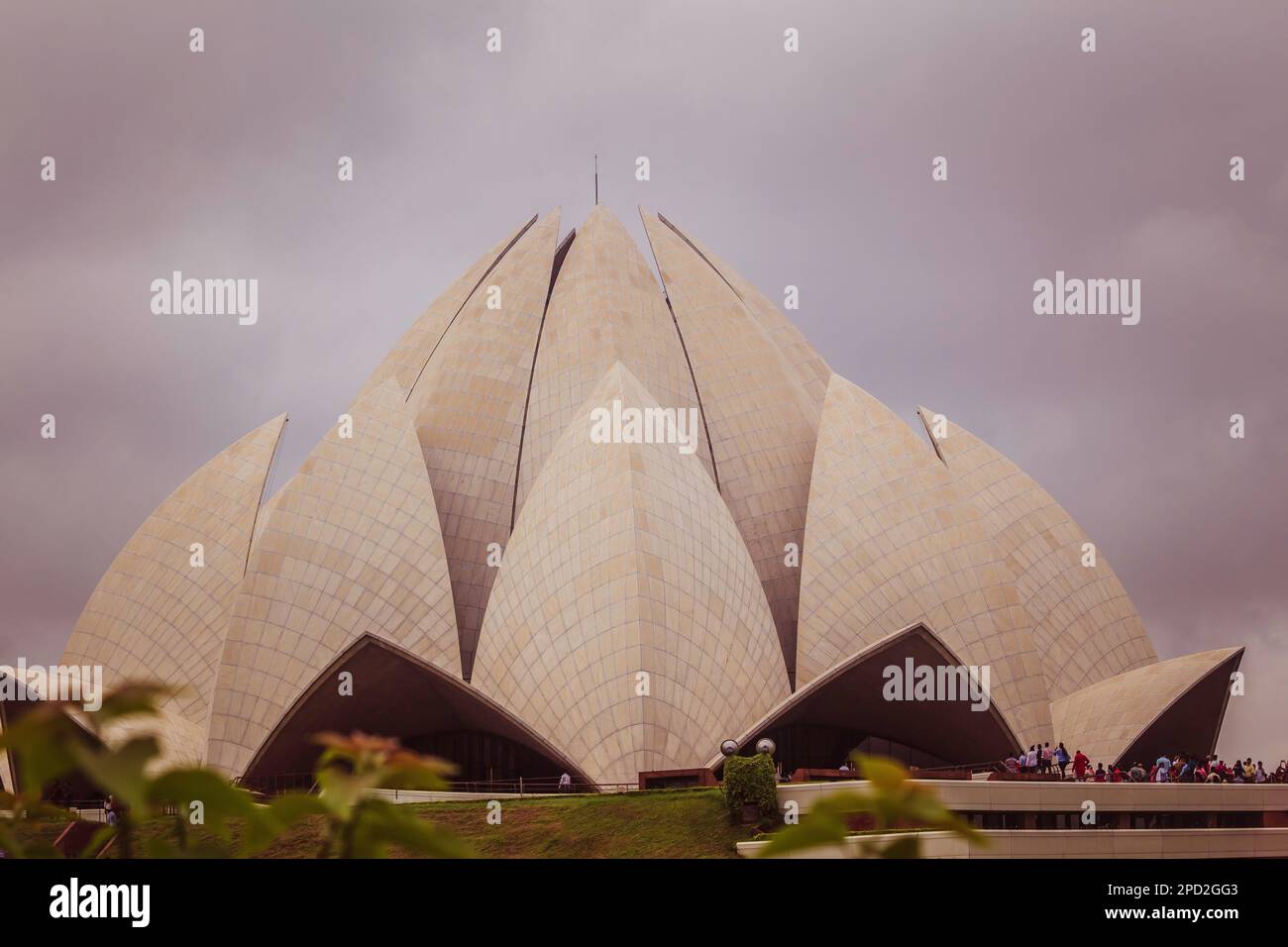 A group of people leisurely stroll through the grounds of the iconic ...
