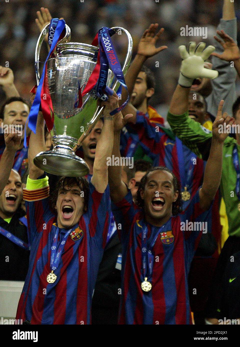 Barcelona players lift the trophy after winning the Champions