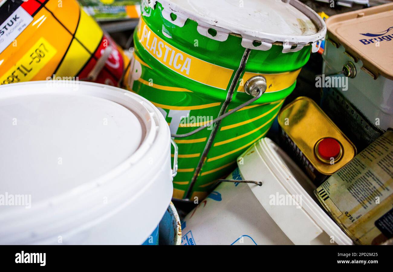 Used paint cans storage to recycle,recycling center Stock Photo Alamy