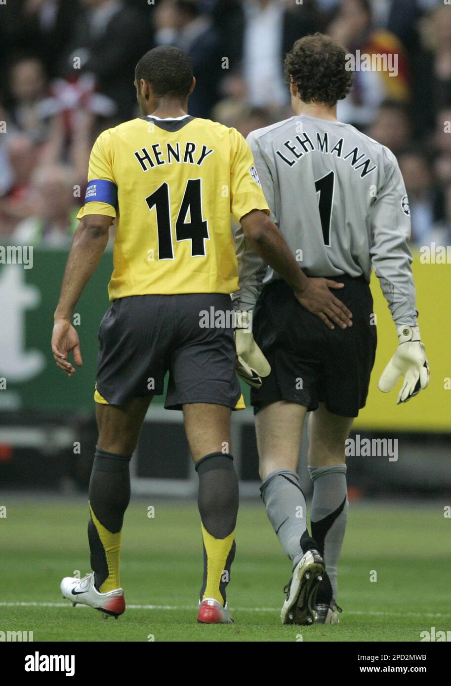 Arsenal French captain Thierry Henry, left, consoles his goalkeeper Jens  Lehmann, of Germany, after Lehmann was given a red card during their  Champions League final soccer match against Barcelona in the Stade