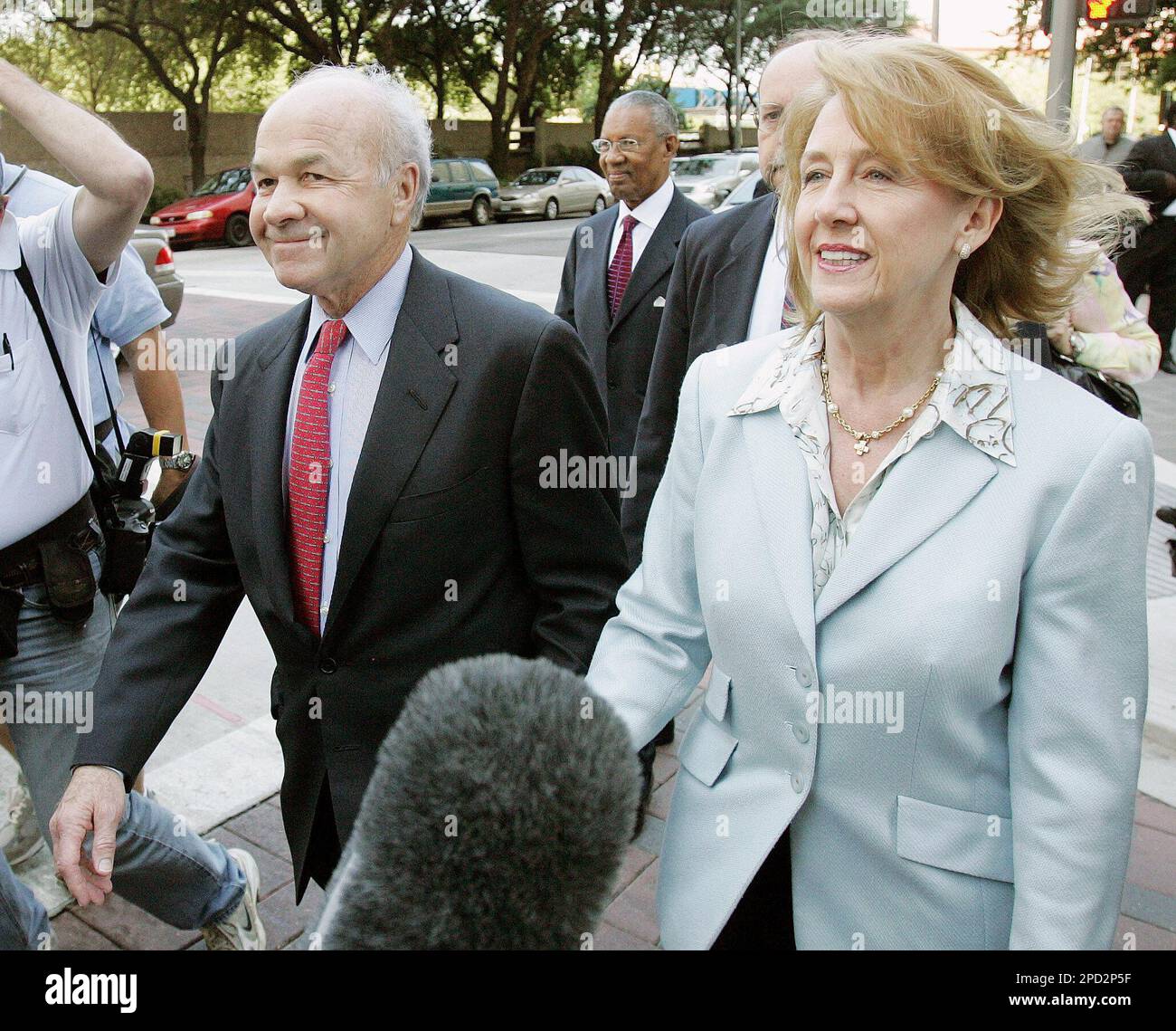 Enron founder Kenneth Lay, left, and his wife, Linda, leave the federal ...