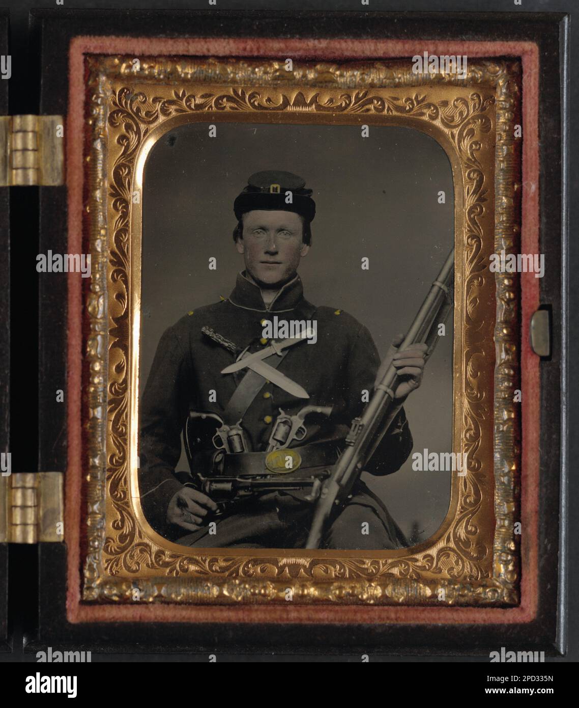 Unidentified soldier in Union uniform with three Remington revolvers
