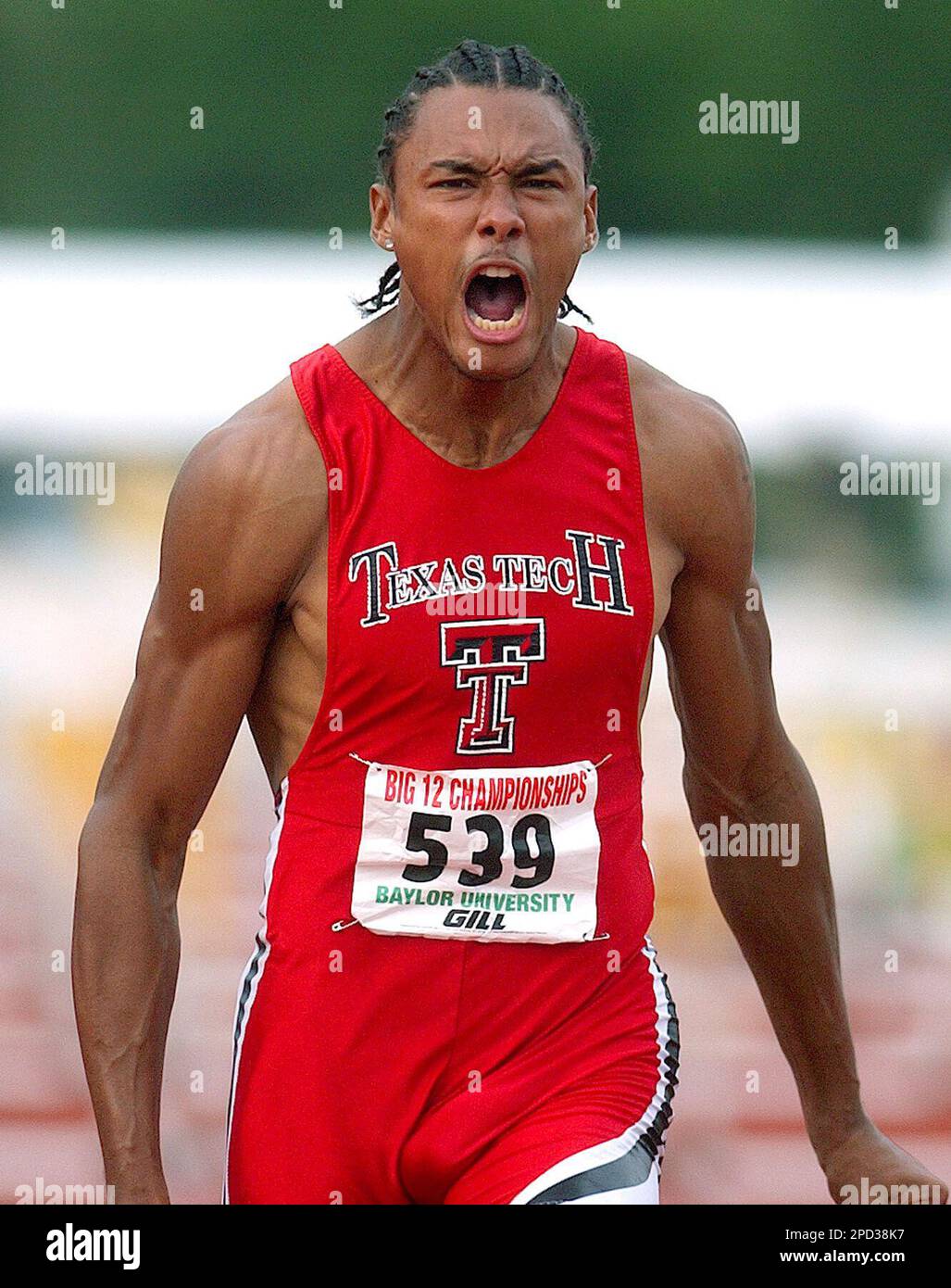 Texas Tech's Shawon Harris shouts in celebration after taking first in