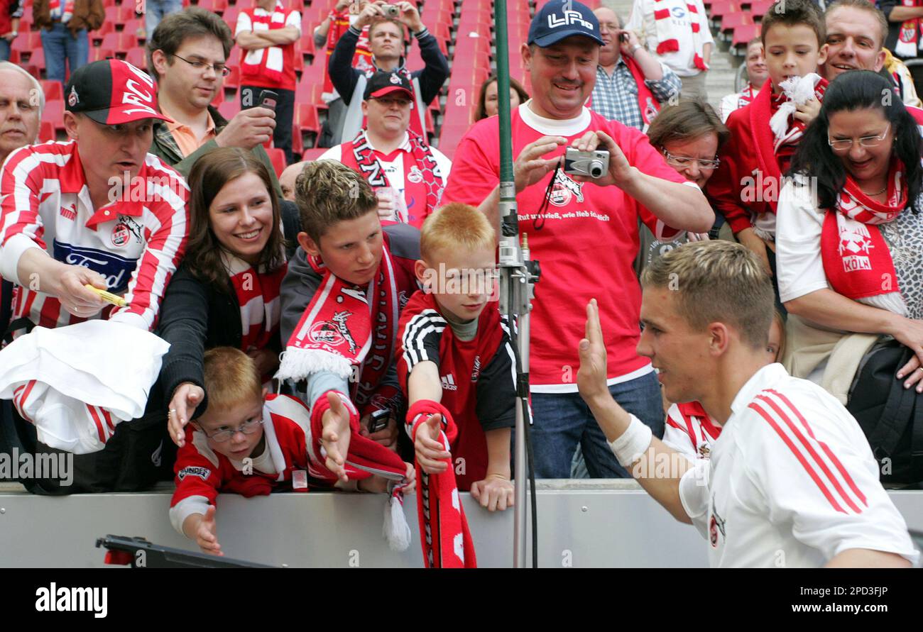 Cologne's Lukas Podolski's shoes with the name of his son Louis are seen  during the German first division Bundesliga soccer match between FC Cologne  and Eintracht Frankfurt in Cologne, Germany, Saturday, Aug.