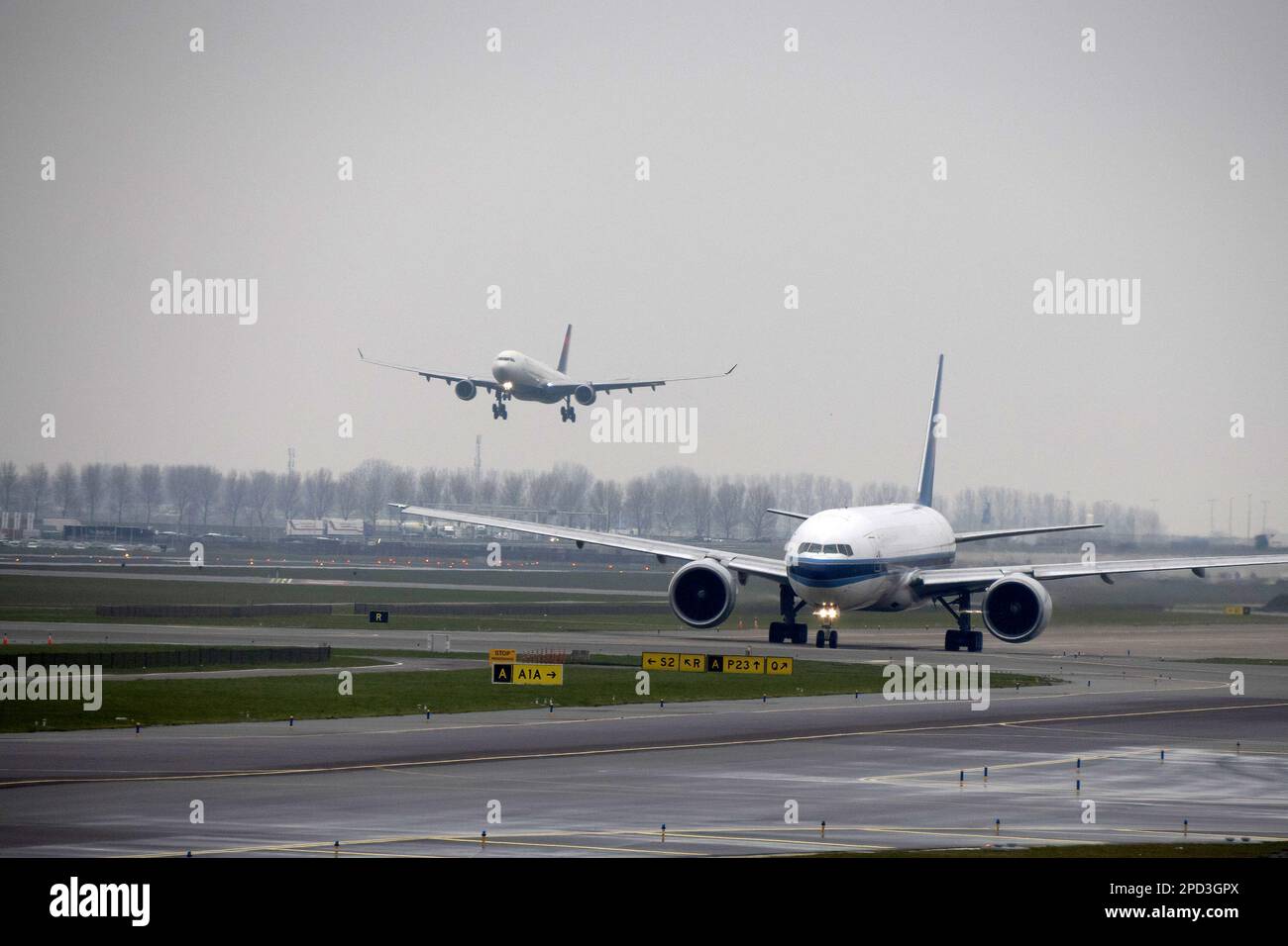 Airplane Boeing 747 About To Touchdown At Amsterdam Schiphol Airport