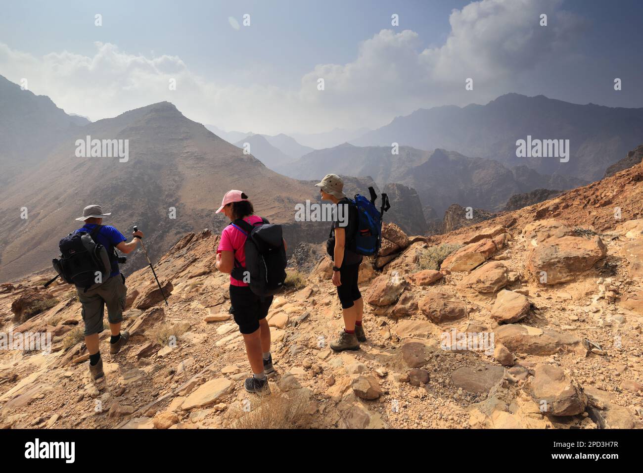 Walkers on the Jordan trail in Wadi Feid, Jabal Fied, Al-Sharat area of ...