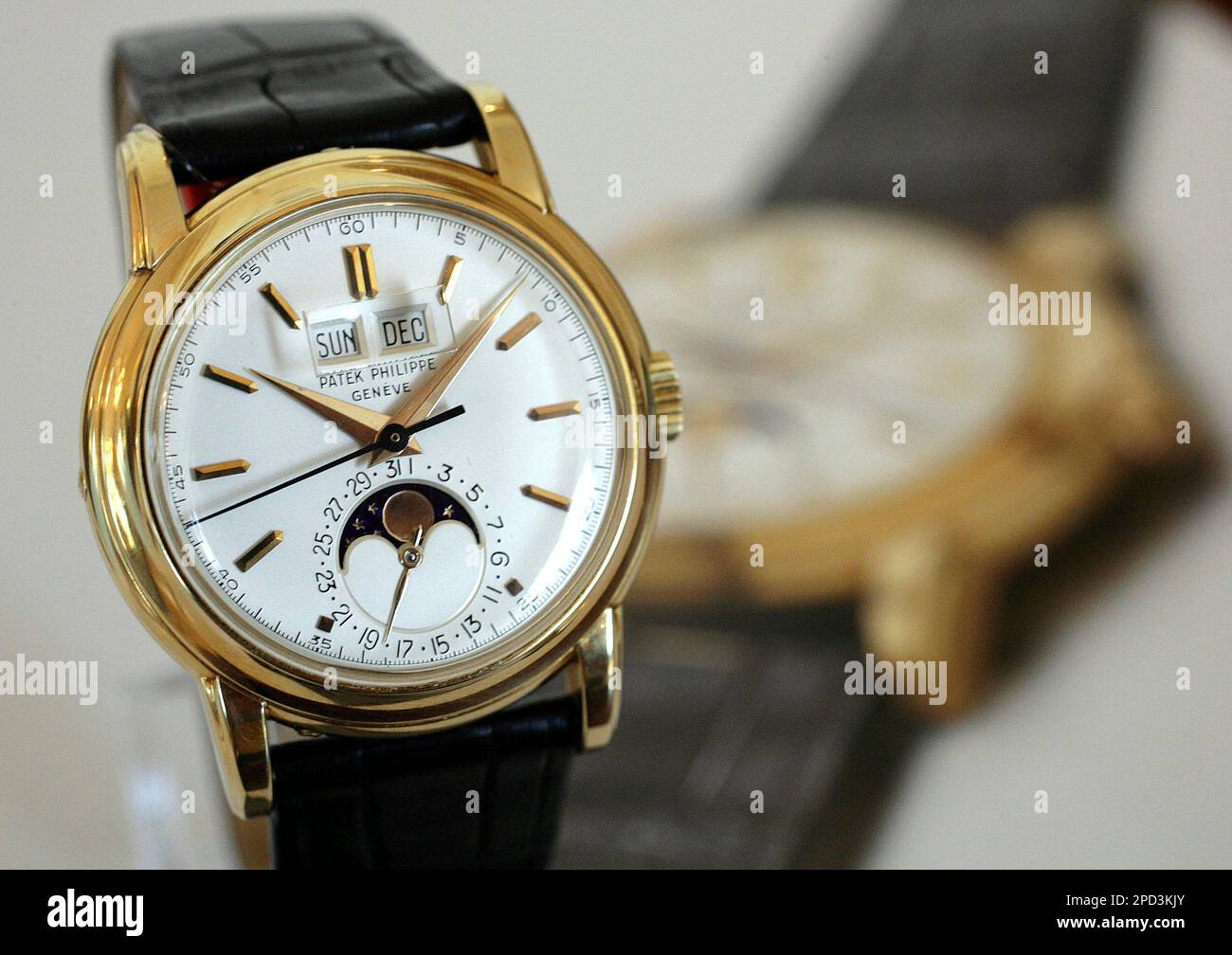 A Patek Philippe wrist watch, pictured during a press preview in Geneva,  Switzerland, Friday, May 12, 2006. The 18K gold perpetual calendar watch  with sweep centre seconds, phases of the moon, screw