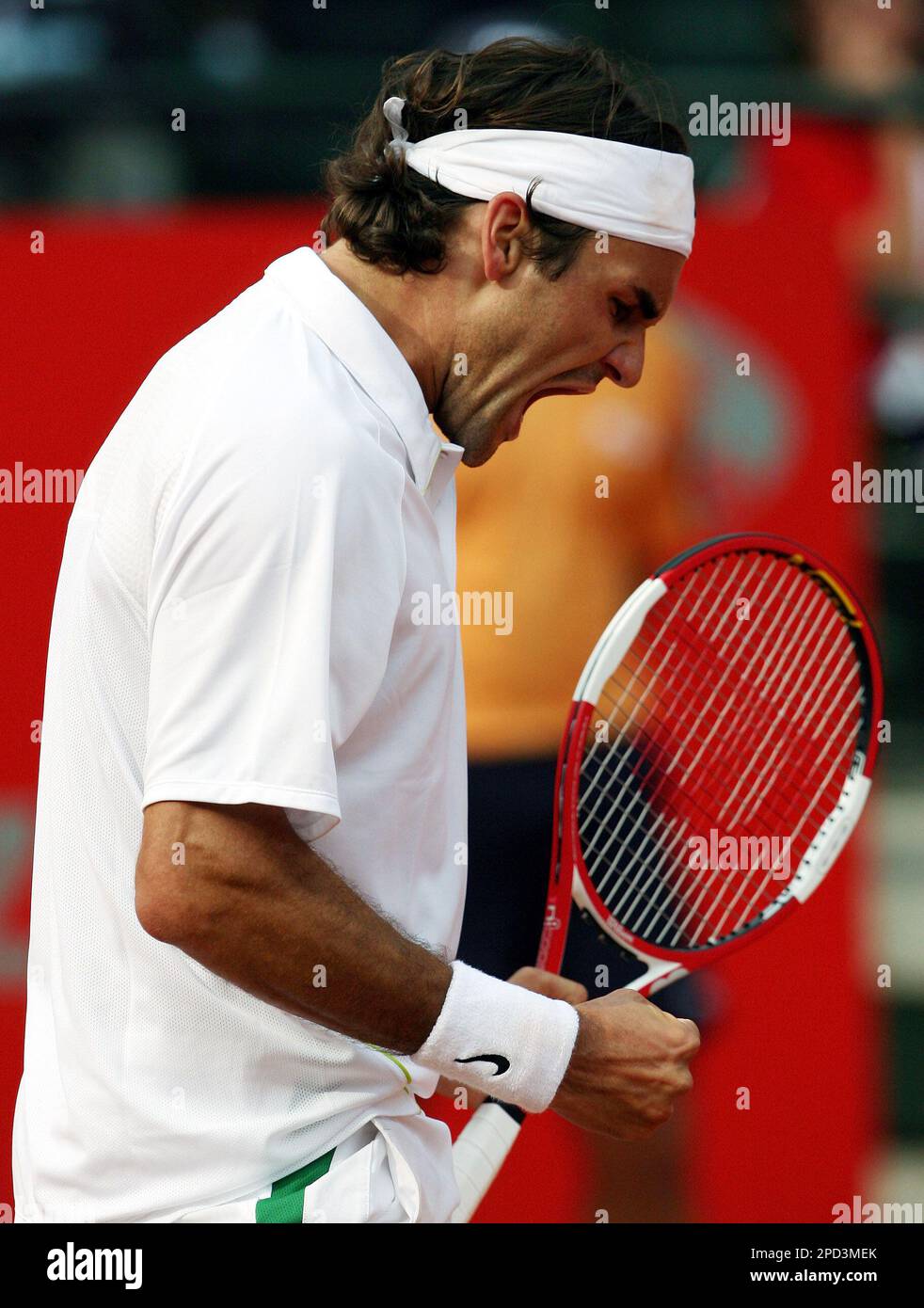 Switzerland's Roger Federer reacts after winning a point to Spain's Nicolas  Almagro during the quarterfinals of the Rome Masters tennis tournament, in  Rome, Friday, May 12, 2006. Federer won the match 6-3,