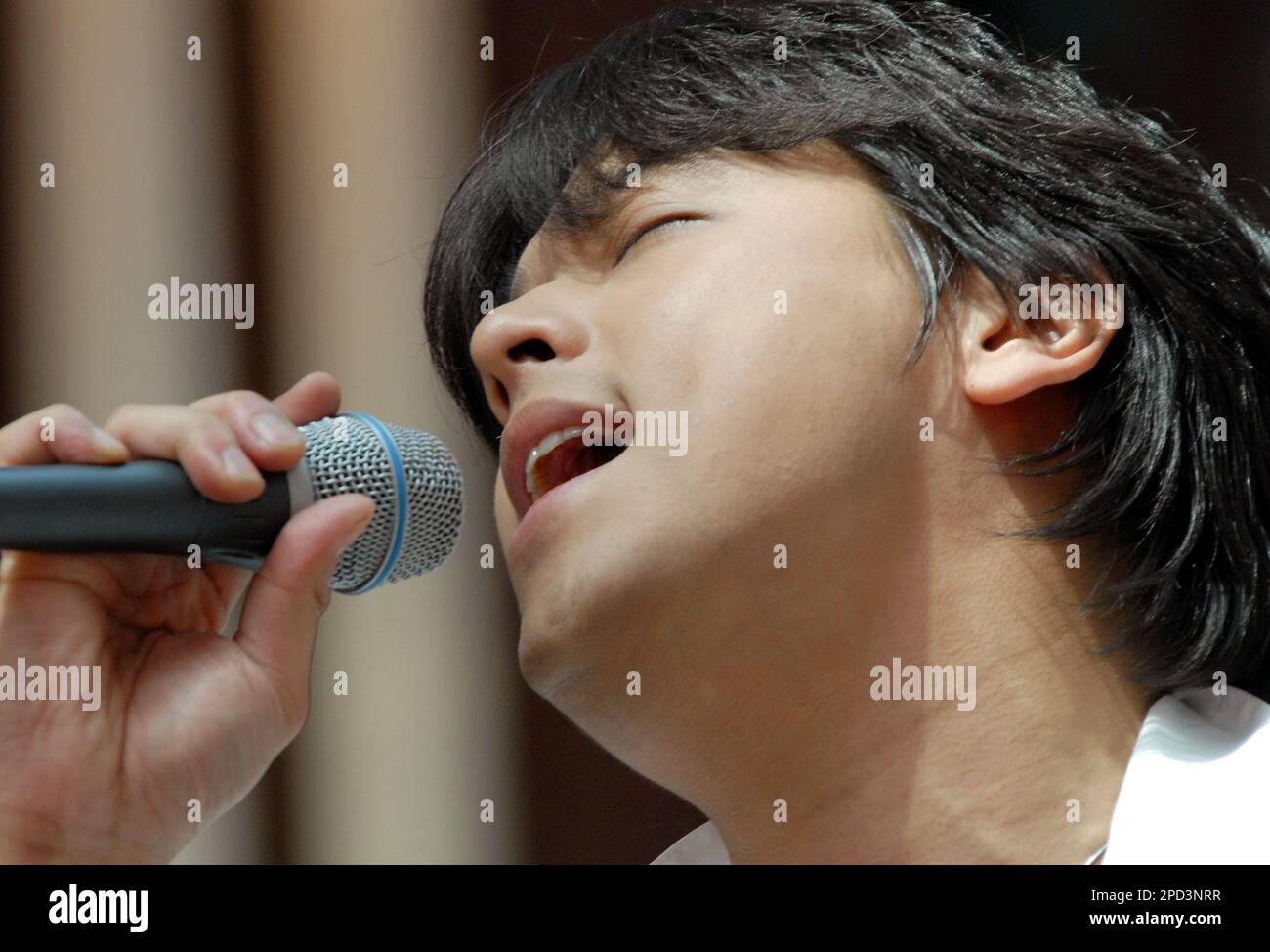 South Korean pop star Ryu Siwon sings during a special open-air ...