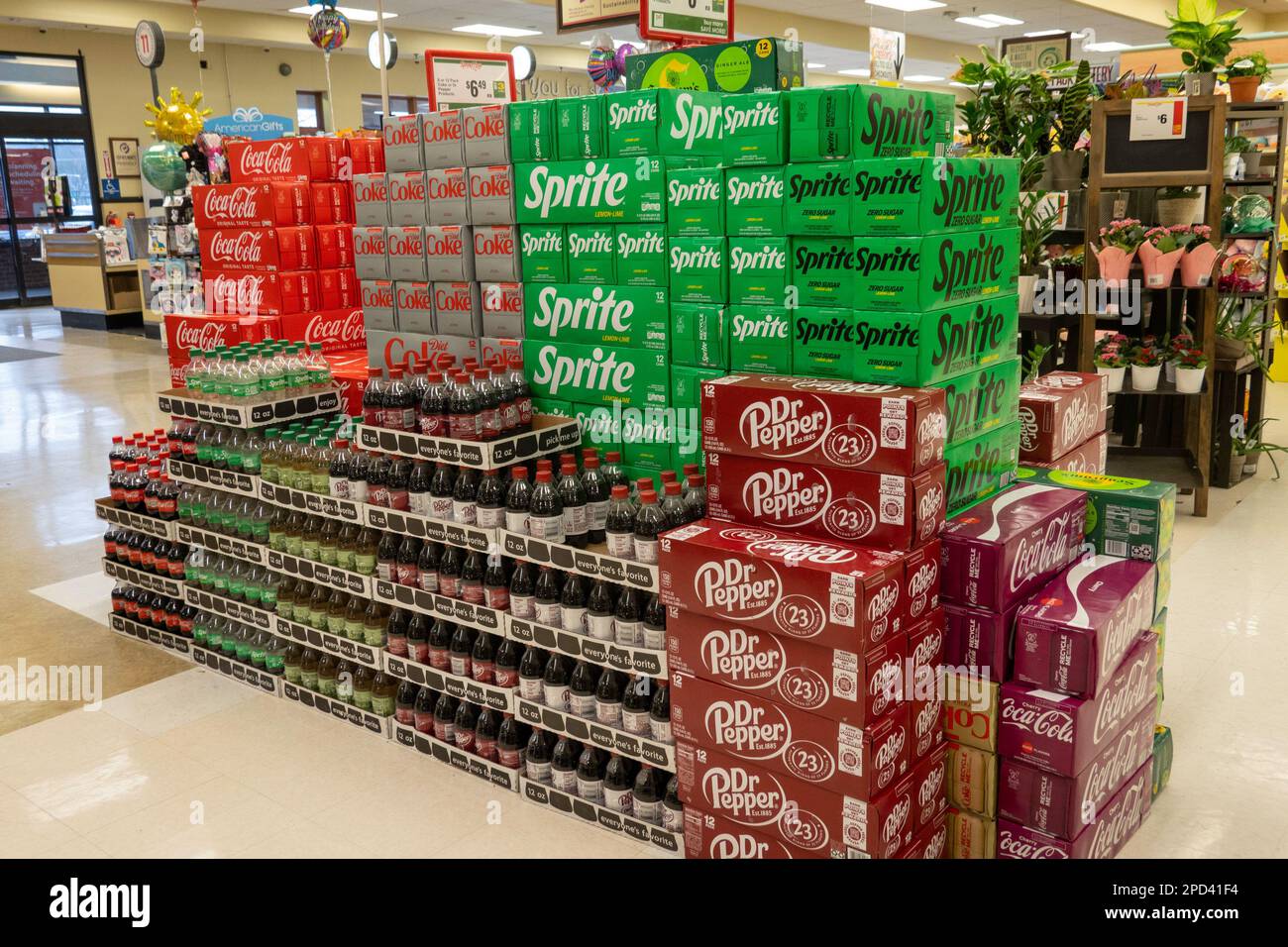 An end aisle display of CocaCola soft drink products at Weis