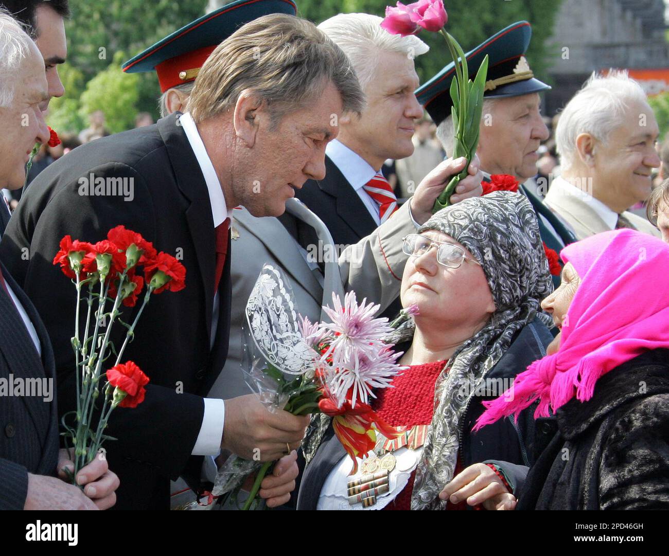 Ukrainian President Viktor Yushchenko, left, greets World War Two ...