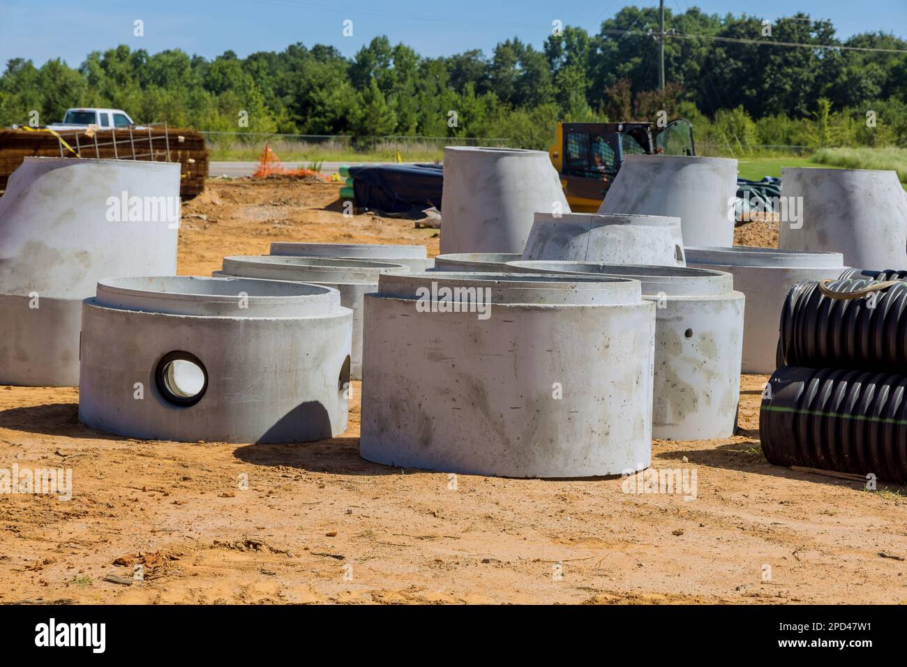 Concrete rings for the well and sewer are in stock. Concrete products for  construction. 8939962 Stock Photo at Vecteezy