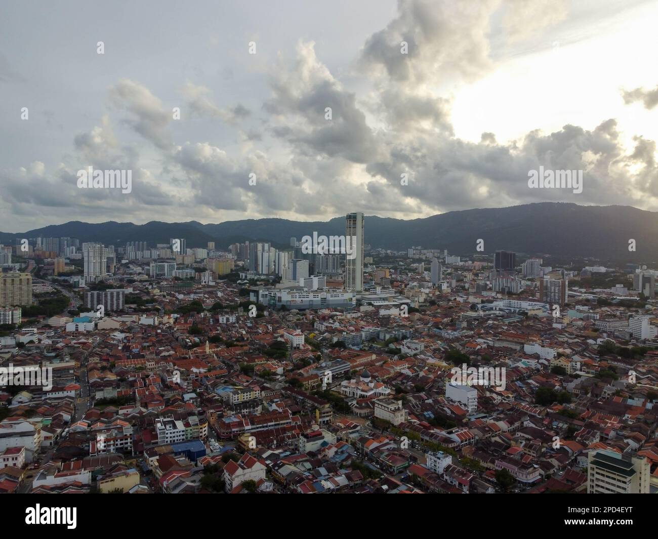 George Town, Penang, Malaysia - May 27 2022: Aerial view Komtar building and heritage old building in sunset cloud Stock Photo