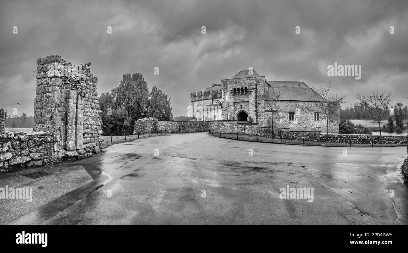 This monochrome black & white image is of the 11th, 12th century Norman era Leeds Castle fortified house in rural Kent of Southeast England. Stock Photo