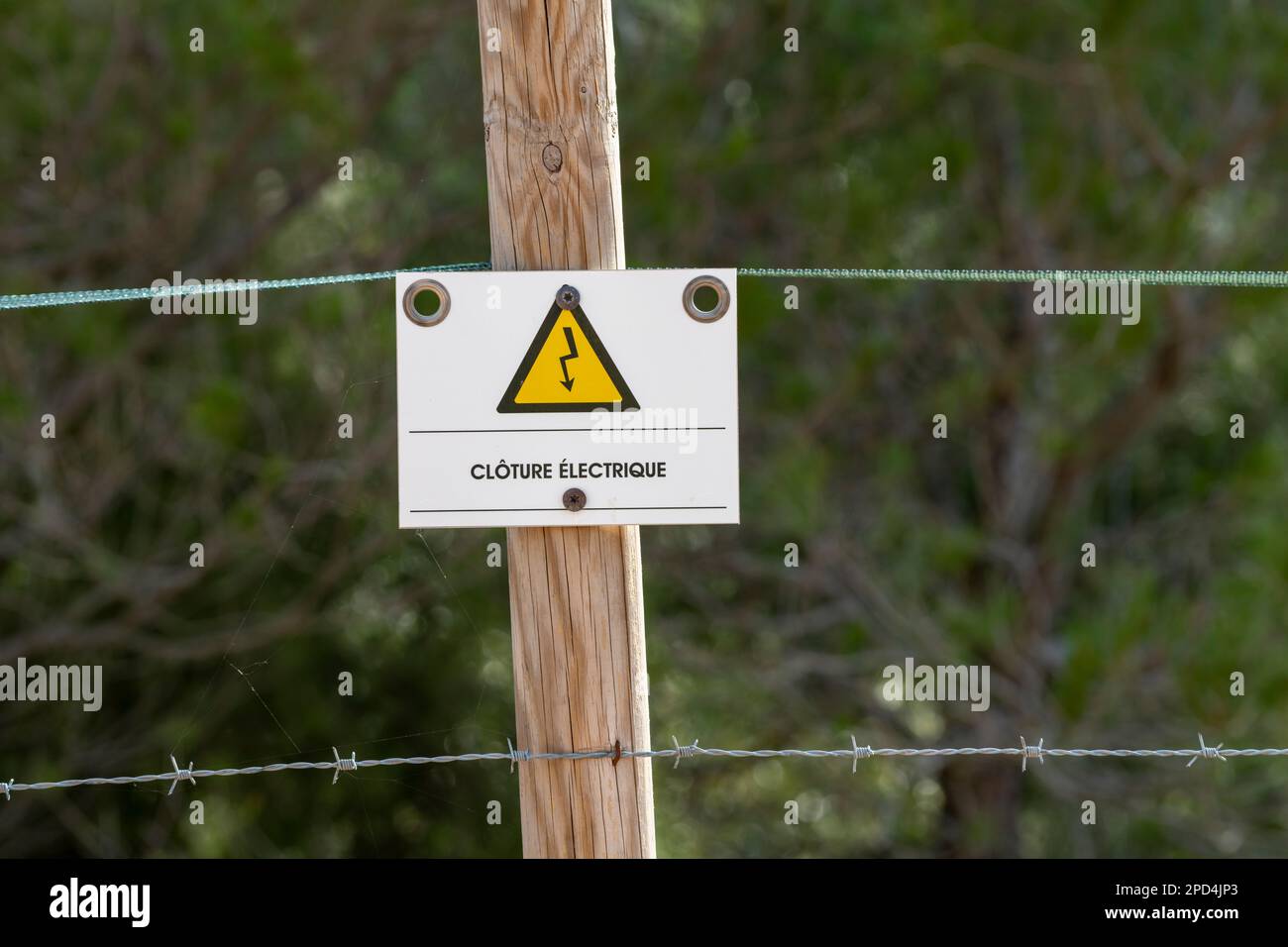 French-written Sign Board Electric Fence, Enhancing Security and Safety, South of France Stock Photo