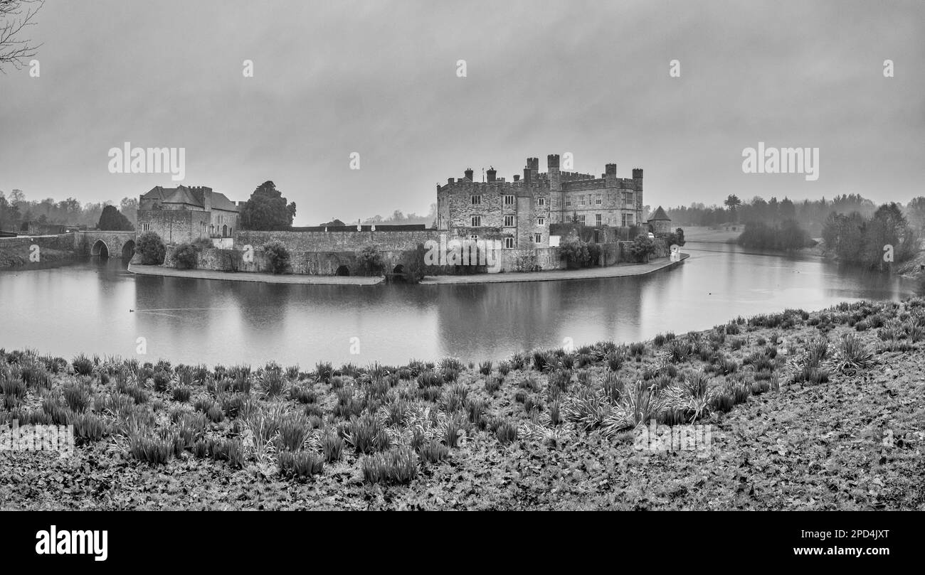 This monochrome black & white image is of the 11th, 12th century Norman era Leeds Castle fortified house in rural Kent of Southeast England. Stock Photo