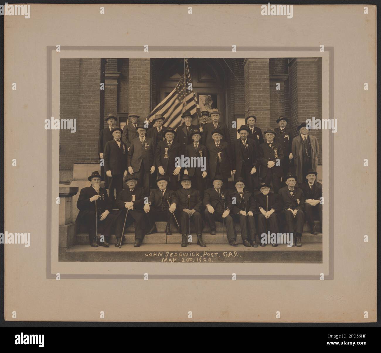 Civil War veterans on steps of a building, John Sedgwick Post G.A.R ...