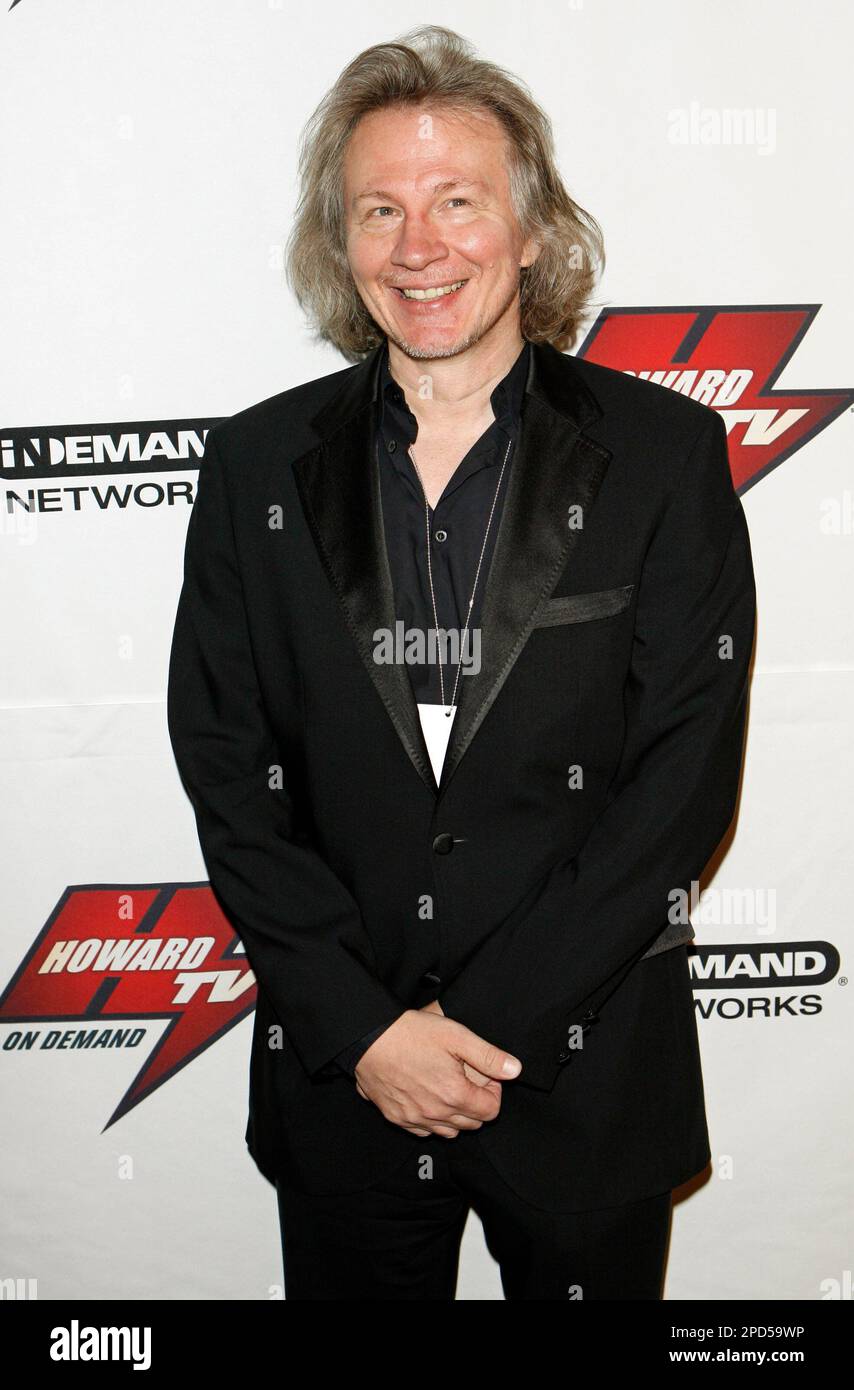 Fred Norris, from the Howard Stern radio show, poses for photographers during red-carpet arrivals at the inaugural Howard Stern 2006 Film Festival, Thursday, April 27, 2006, New York