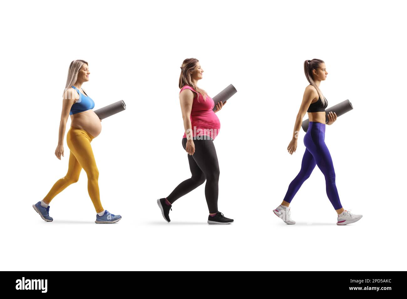 Aerobic coach walking with two pregnant women isolated on white background Stock Photo