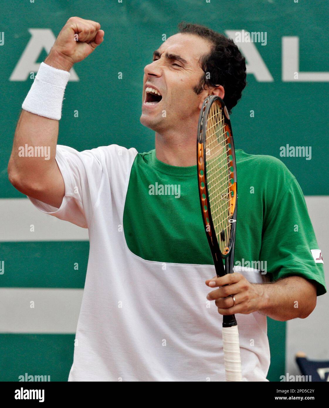 Spanish tennis player Albert Costa reacts after winning a point against  Juan Carlos Ferrero, from Spain, at the Open Seat Godo 2006 in Barcelona,  Spain, Thursday, April 27, 2006. Ferrero won 6-1,
