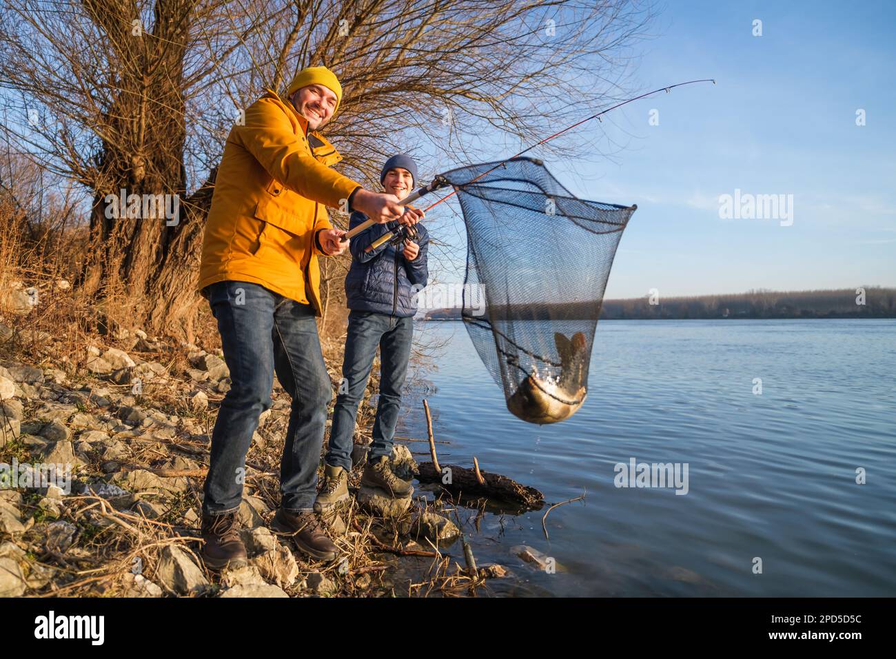 Boy with fish net hi-res stock photography and images - Page 3 - Alamy