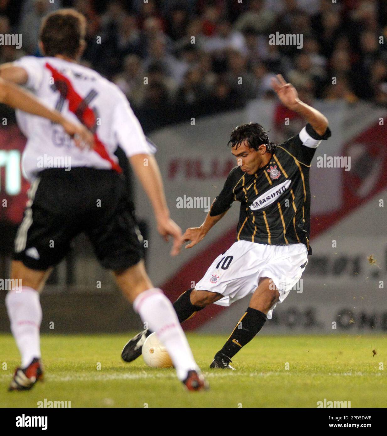 Argentina's Carlos Tevez of Brazil's Corinthians, kicks the
