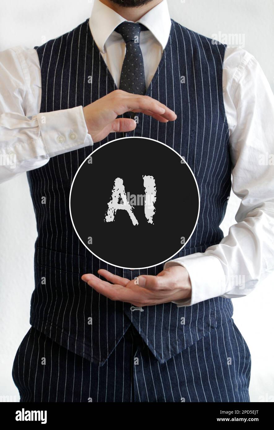 Man in suit holding a sign with Artificial Intelligence written on it Stock Photo