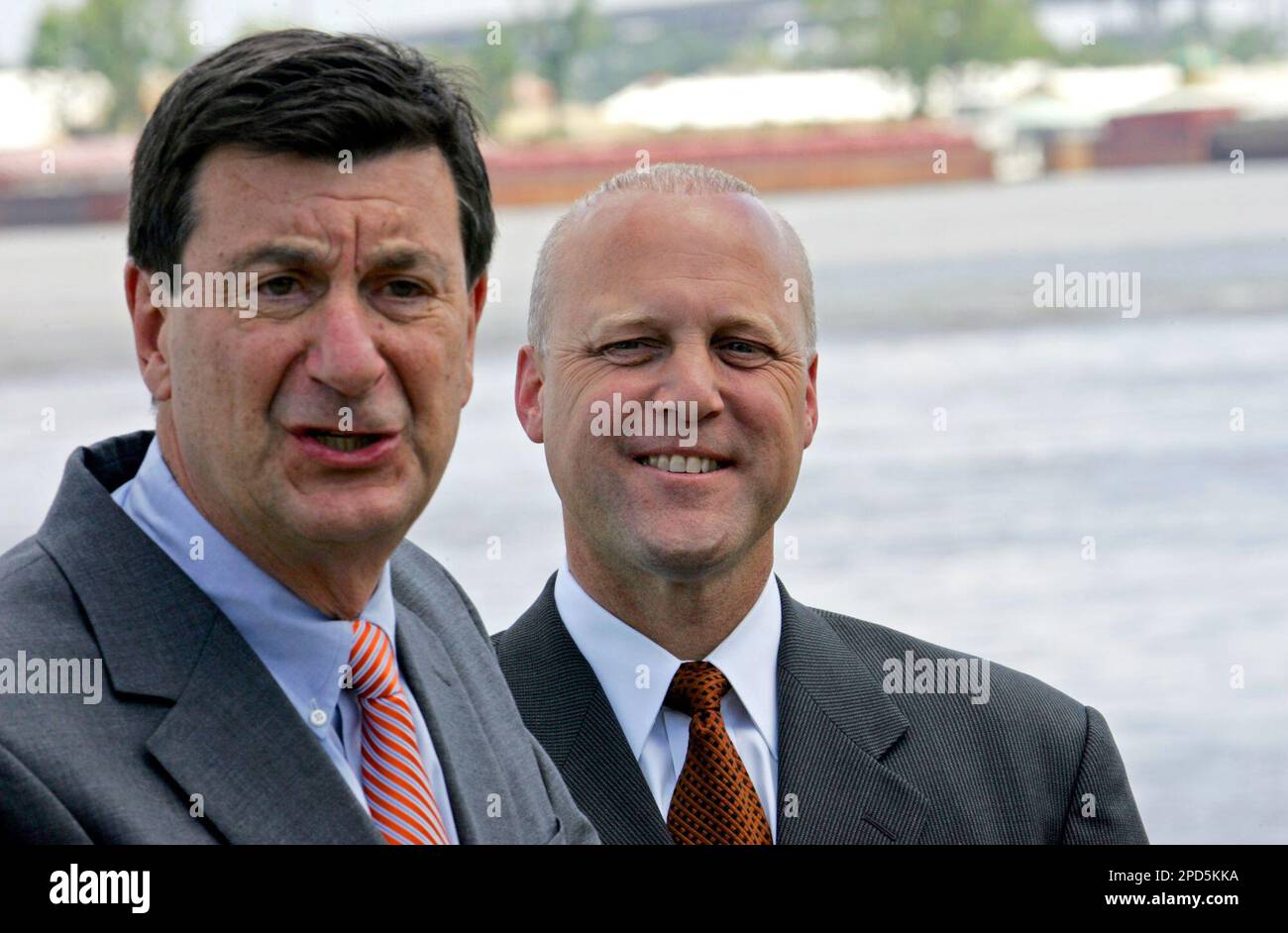 Louisiana Lt. Gov. Mitch Landrieu, right, looks on as former New