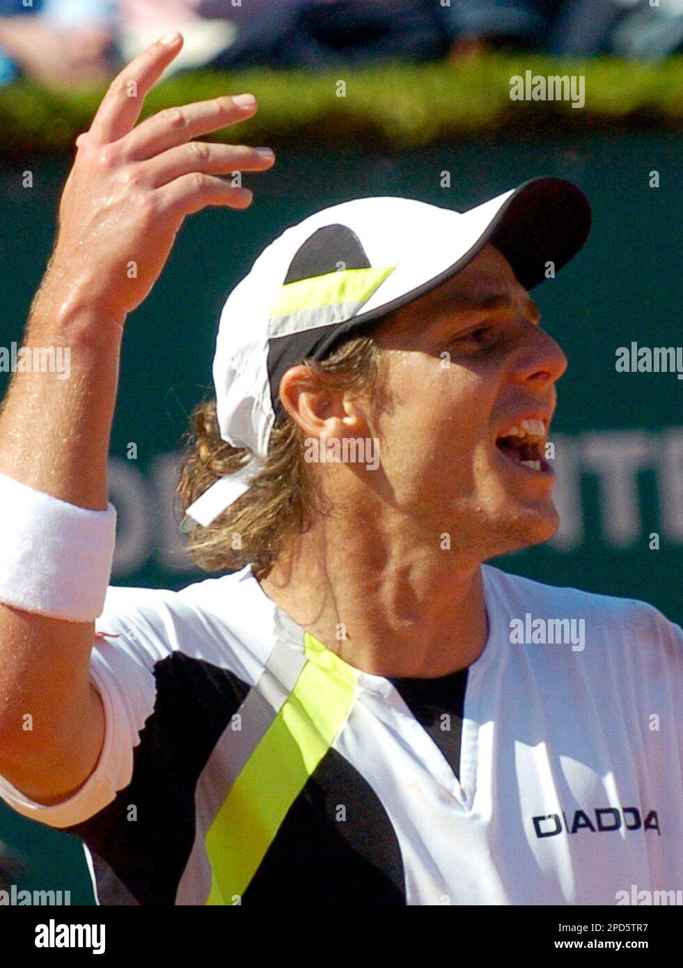 Gaston Gaudio of Argentina reacts after losing a point against Rafael Nadal  of Spain during their semi final match of the Monte Carlo Open Tennis  tournament in Monaco, Saturday, April 22, 2006.