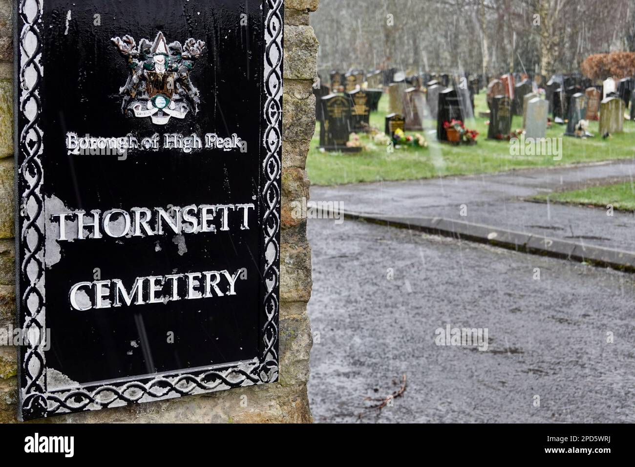 Sleet falls on Thornsett Cemetery, Derbyshire Stock Photo
