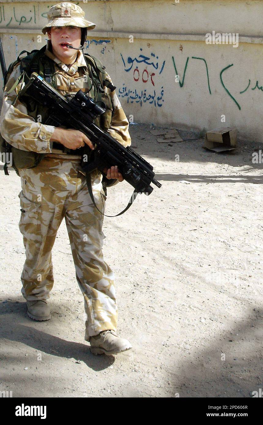 A British soldier patrols Friday April 21 2006 in Basra Iraq #39 s second A British soldier patrols Friday April 21 2006 in Basra Iraq #39 s second