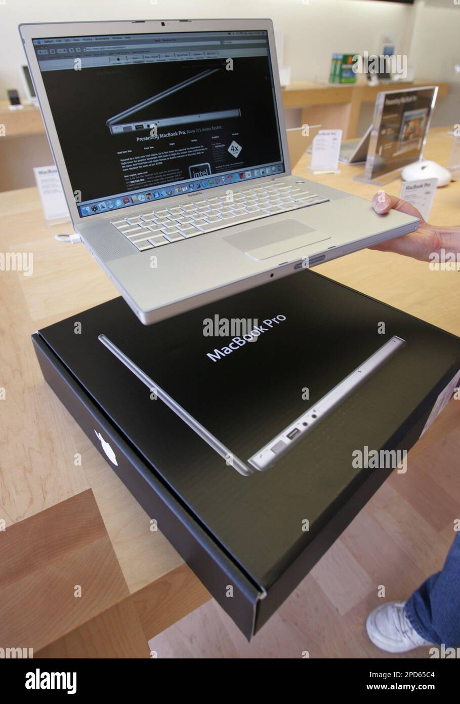 Apple MacBook Pro is on display at an Apple Store in Palo Alto, Calif ...