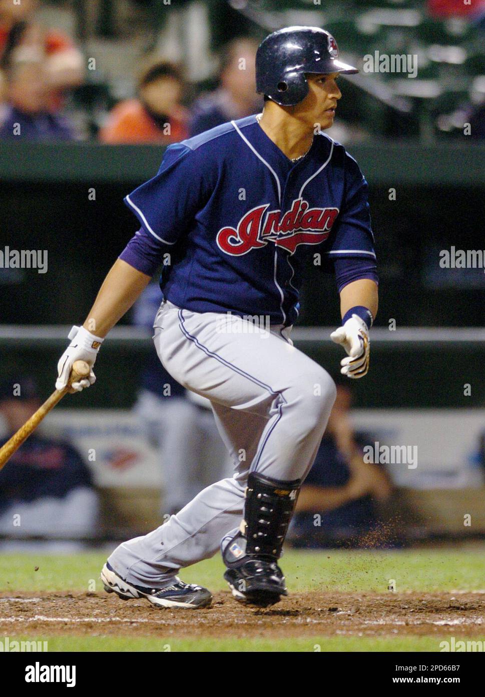 Cleveland Indians' Victor Martinez follows through on a single off  Baltimore Orioles pitcher Jim Brower in the eighth inning of a baseball  game Tuesday, April 18, 2006, in Baltimore. Martinez also had