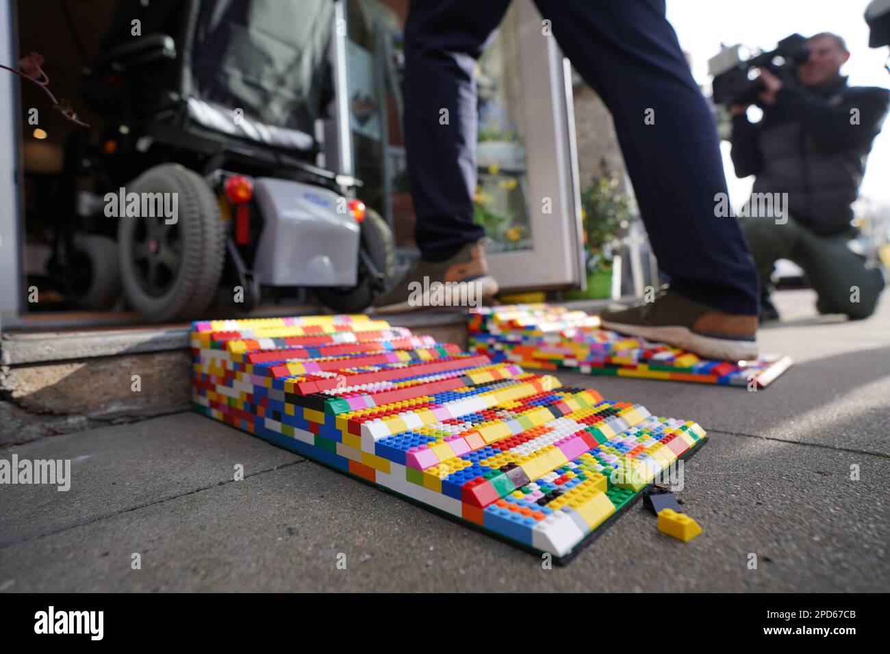 Hamburg, Germany. 14th Mar, 2023. Wheelchair user Inge Janke drives ...