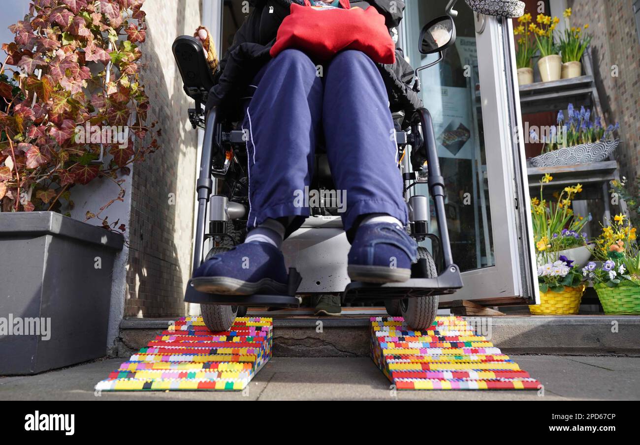 Hamburg, Germany. 14th Mar, 2023. Wheelchair user Inge Janke drives ...