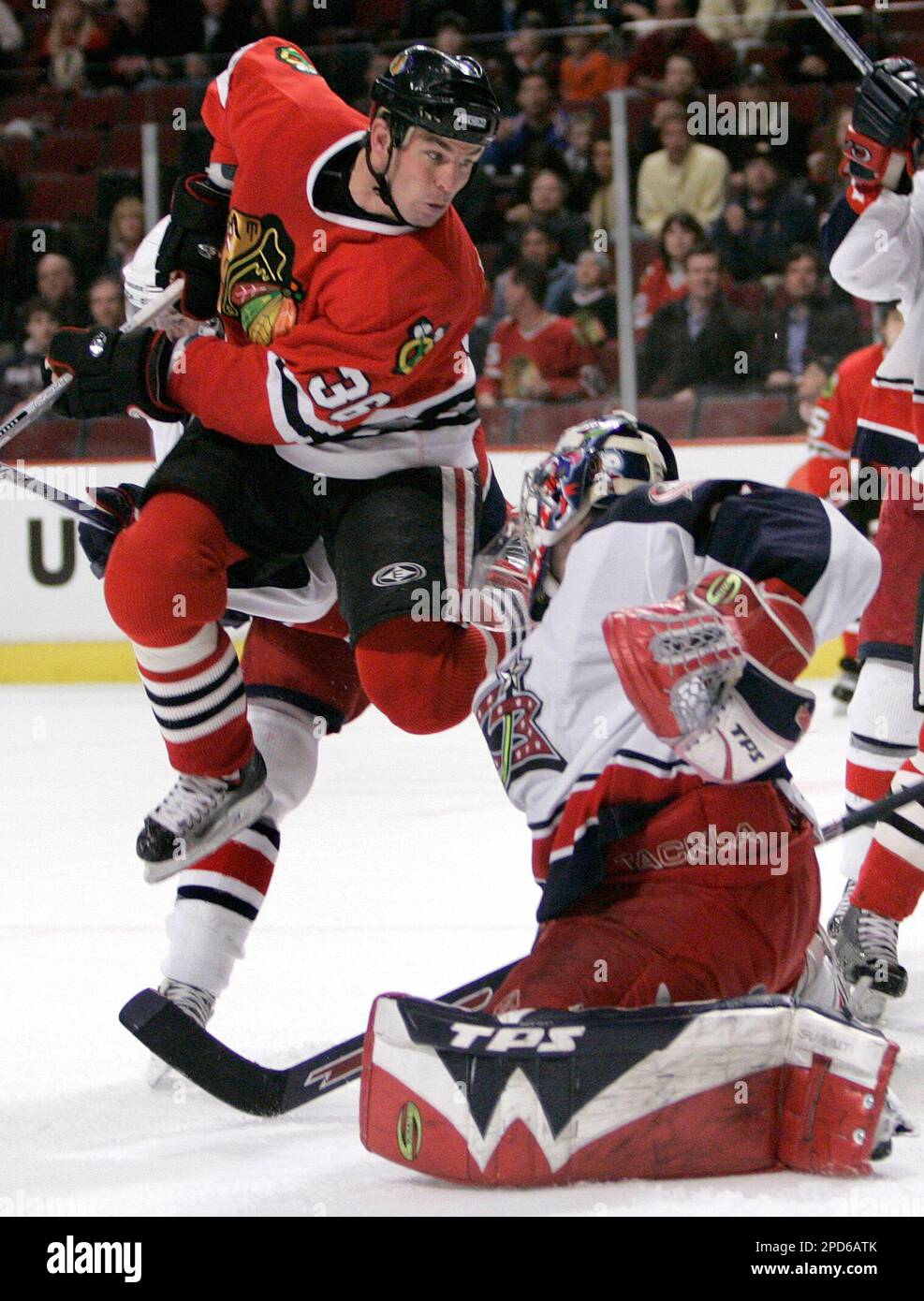 Columbus Blue Jackets goaltender Pascal Leclaire makes a save during first-period  NHL hockey against the New Jersey Devils, Saturday night, Oct. 28, 2006, in  East Rutherford, N.J. (AP Photo/Bill Kostroun Stock Photo 