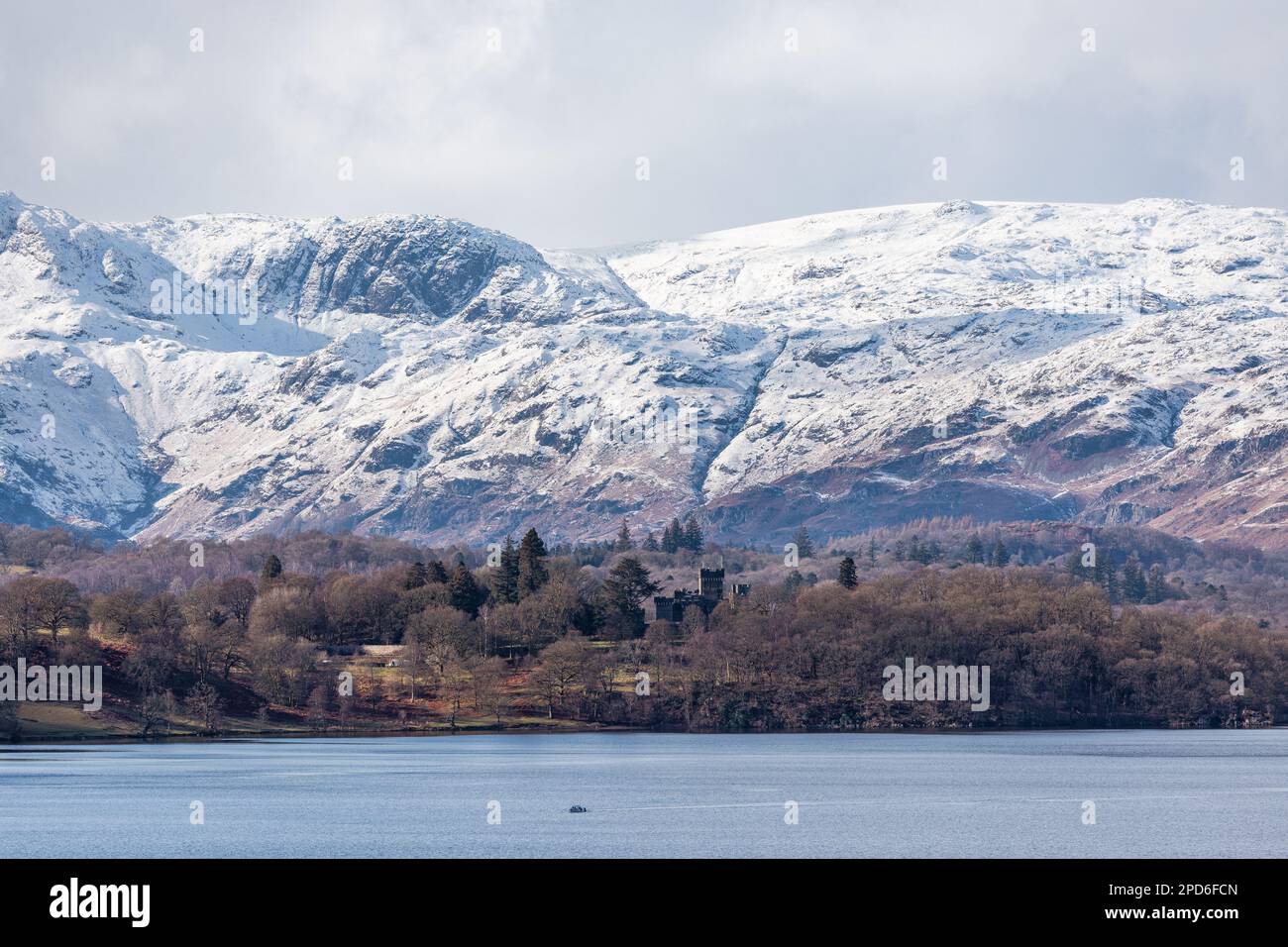 14th March  2023 .UK Weather Afternoon sun on snow covered  fells  above and around   Lake Windermere   Credit: Gordon Shoosmith/ Live News Stock Photo