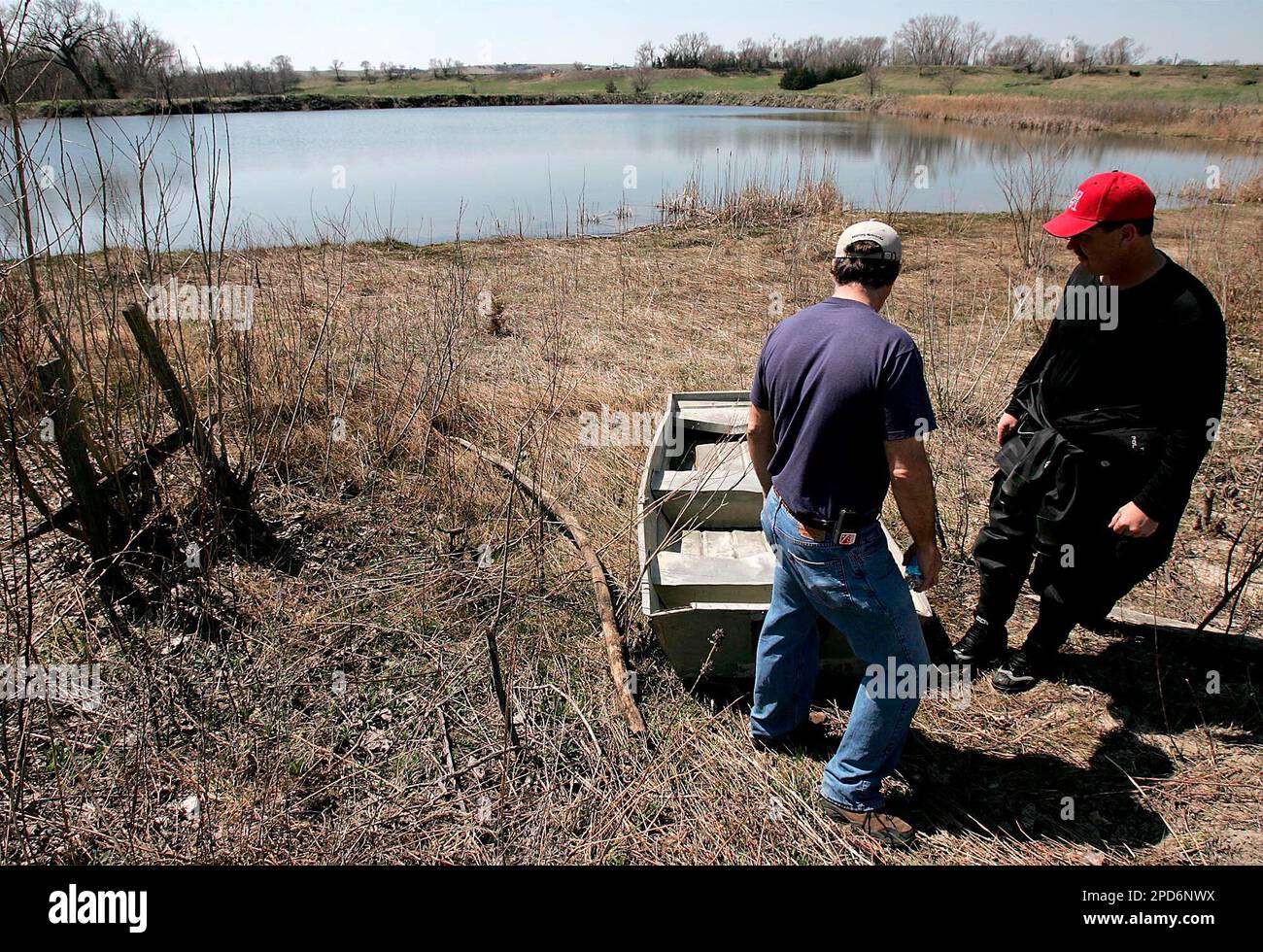 Grand Island dive rescue team member Pat Lonergan, left, and Burwell