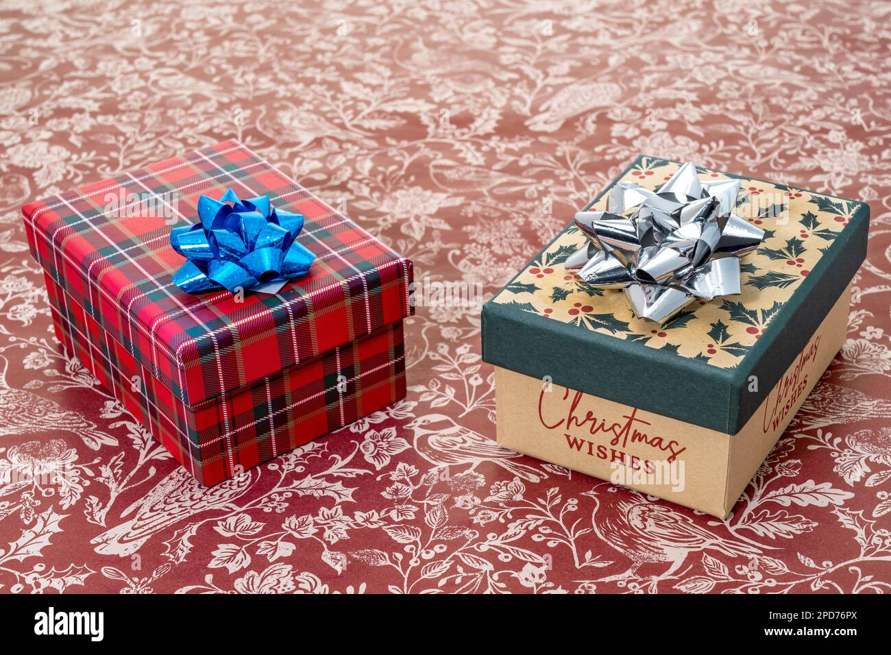 Christmas gift boxes with colourful bows Stock Photo - Alamy