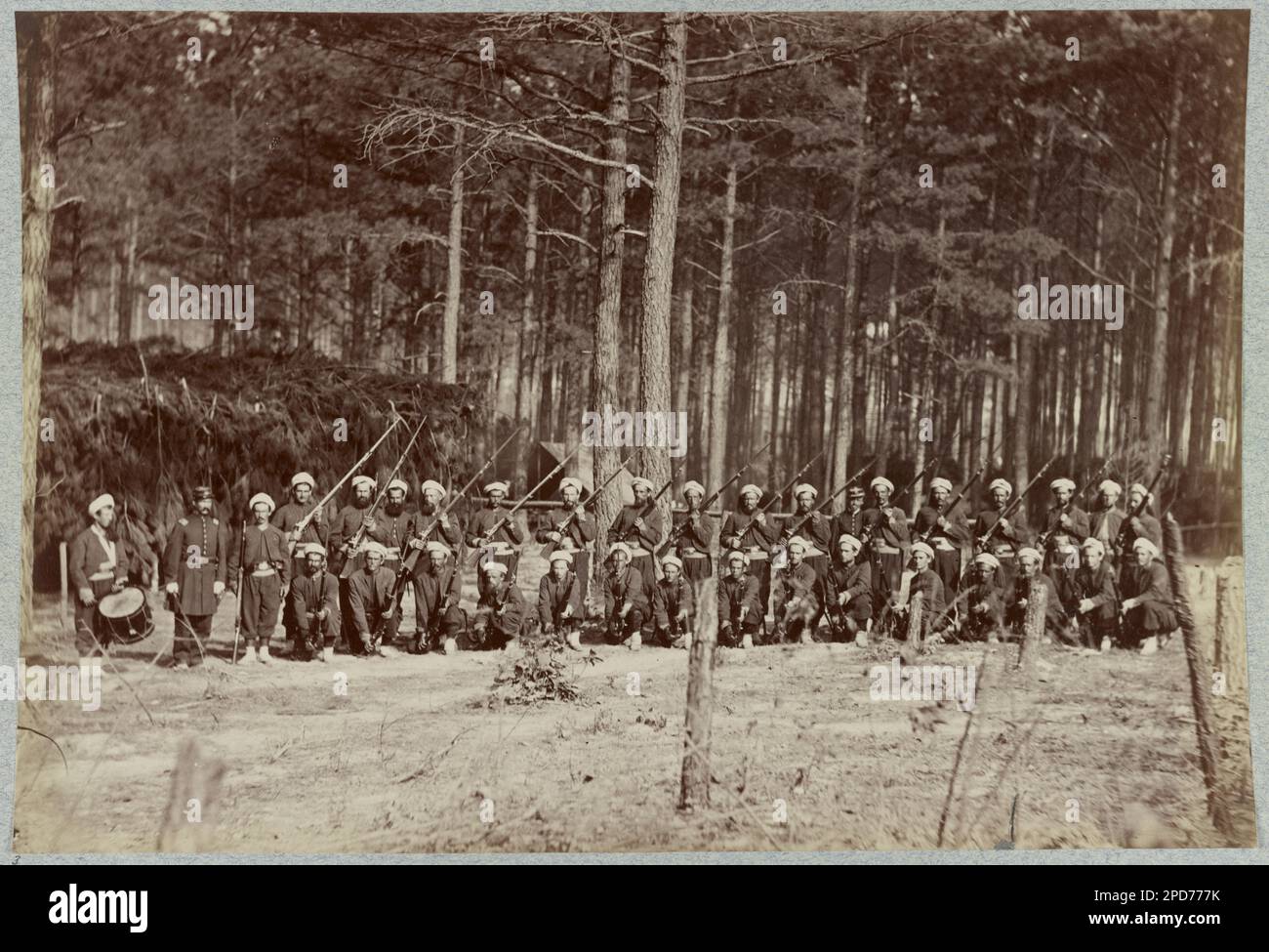 Co. F, 114th Pennsylvania Infantry in front of Petersburg, Virginia, August, 1864. No. 3, Title from item, Gift; Col. Godwin Ordway; 1948. United States, Army, Pennsylvania Infantry Regiment, 114th (1862-1865) , United States, History, Civil War, 1861-1865, United States, Virginia, Petersburg. Stock Photo